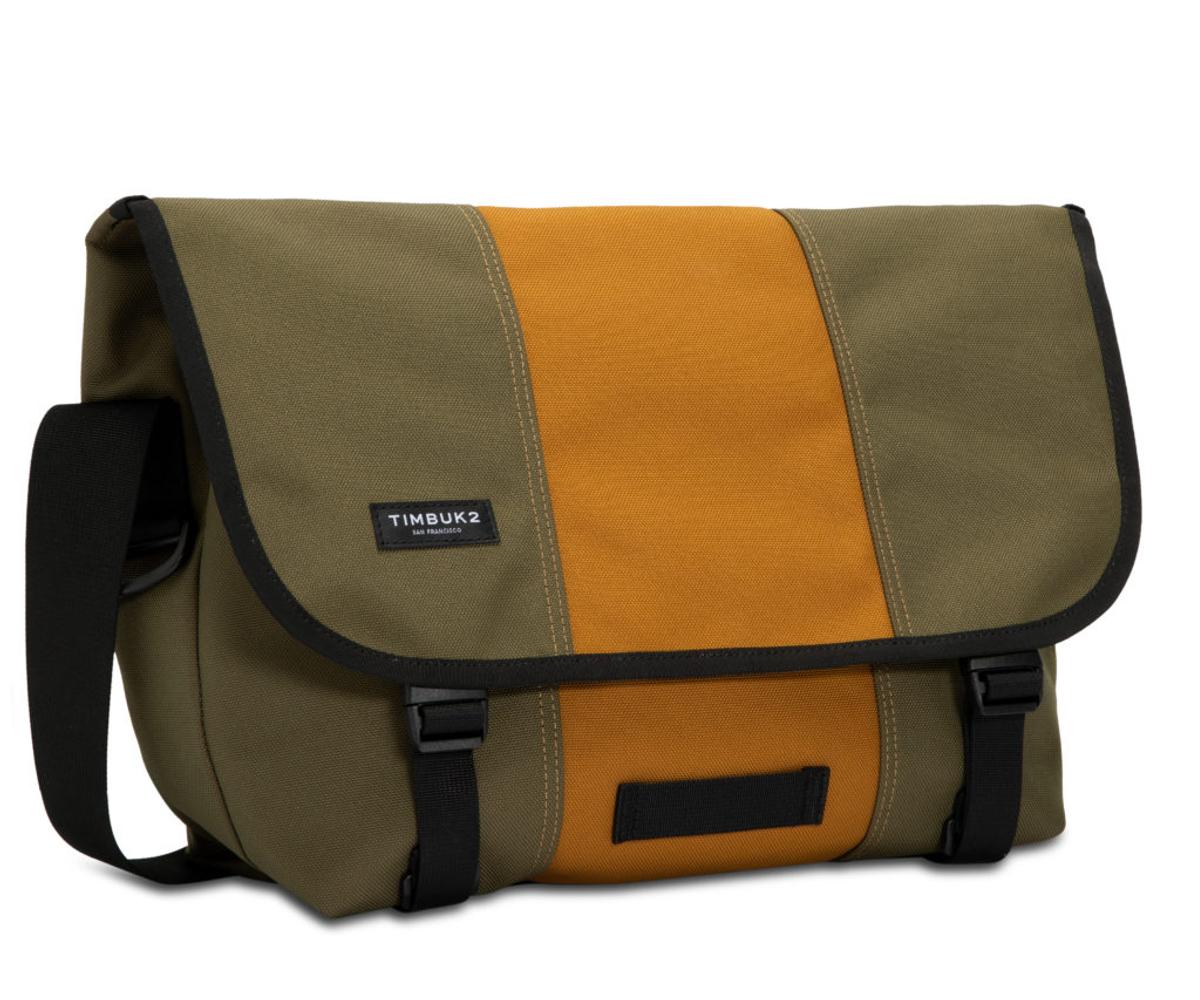 Olive and orange messenger bag with a black "Timbuk2 San Francisco" label on the flap.