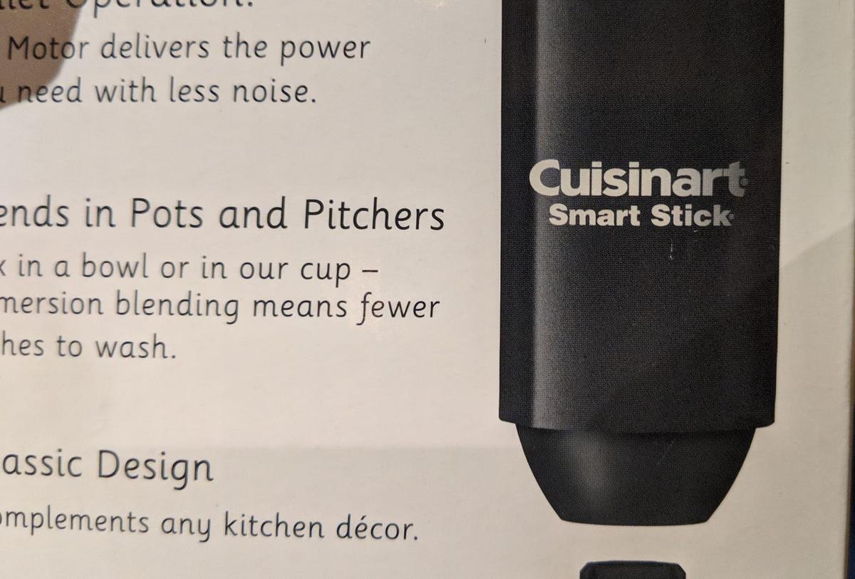 Packaging for the "Cuisinart Smart Stick" immersion blender, beside bullets like "Blends in Pots and Pitchers."