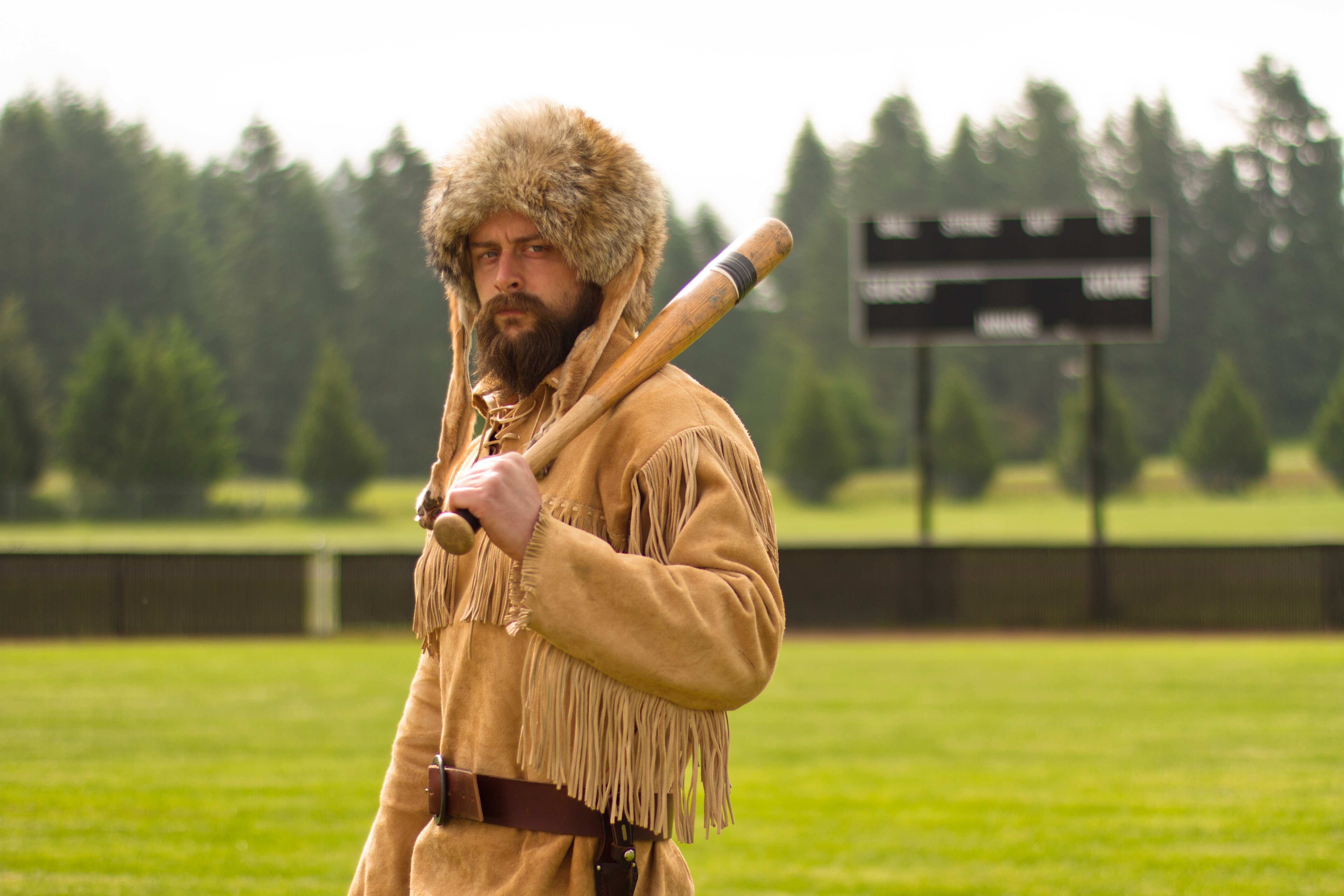 Old Trapper playing baseball