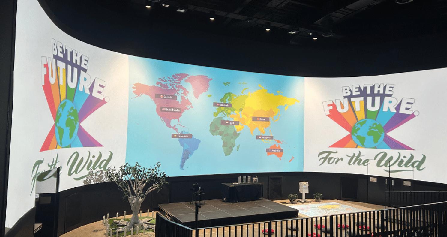 Be The Future incursion space with interactive projector, world map display, and hands-on sustainability learning setup for primary students.