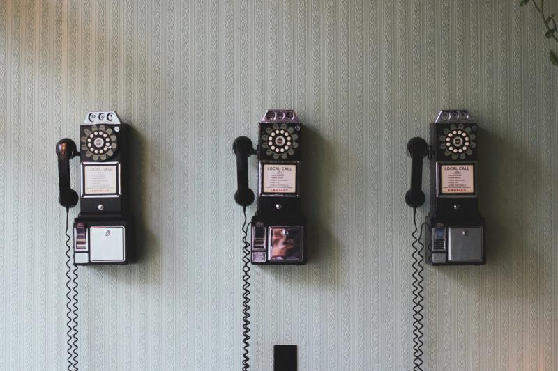 vintage telephone on the wall.