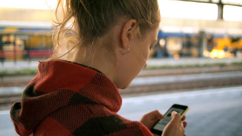 Person checking smartphone