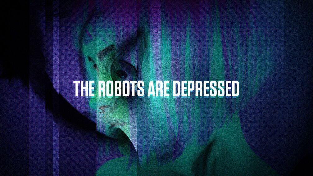 The head of a mannequin robot, laying on its side and looking a bit sad. Text reads: The robots are depressed.