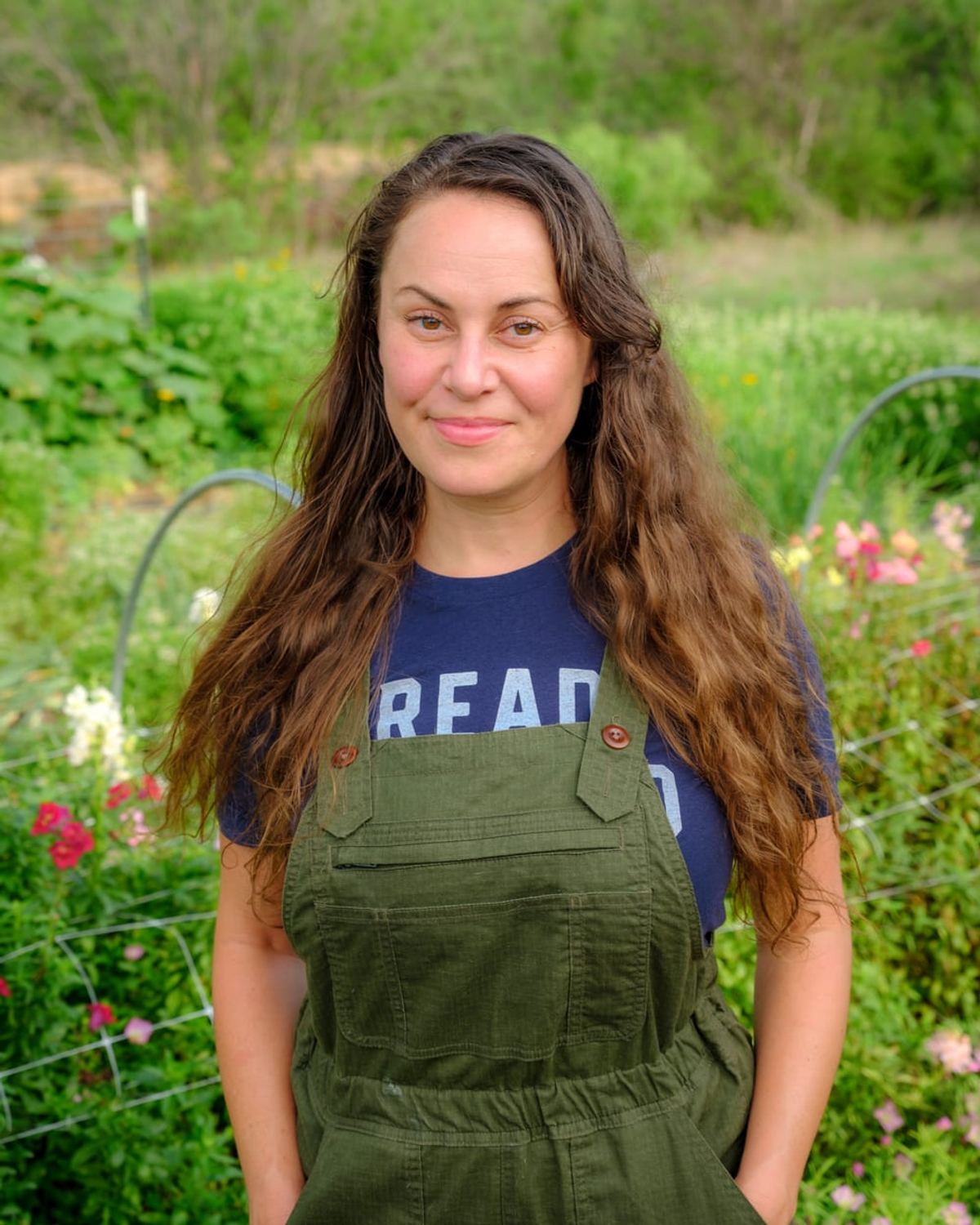 Michelle, founder of The Wild Farm, outdoors at the farm