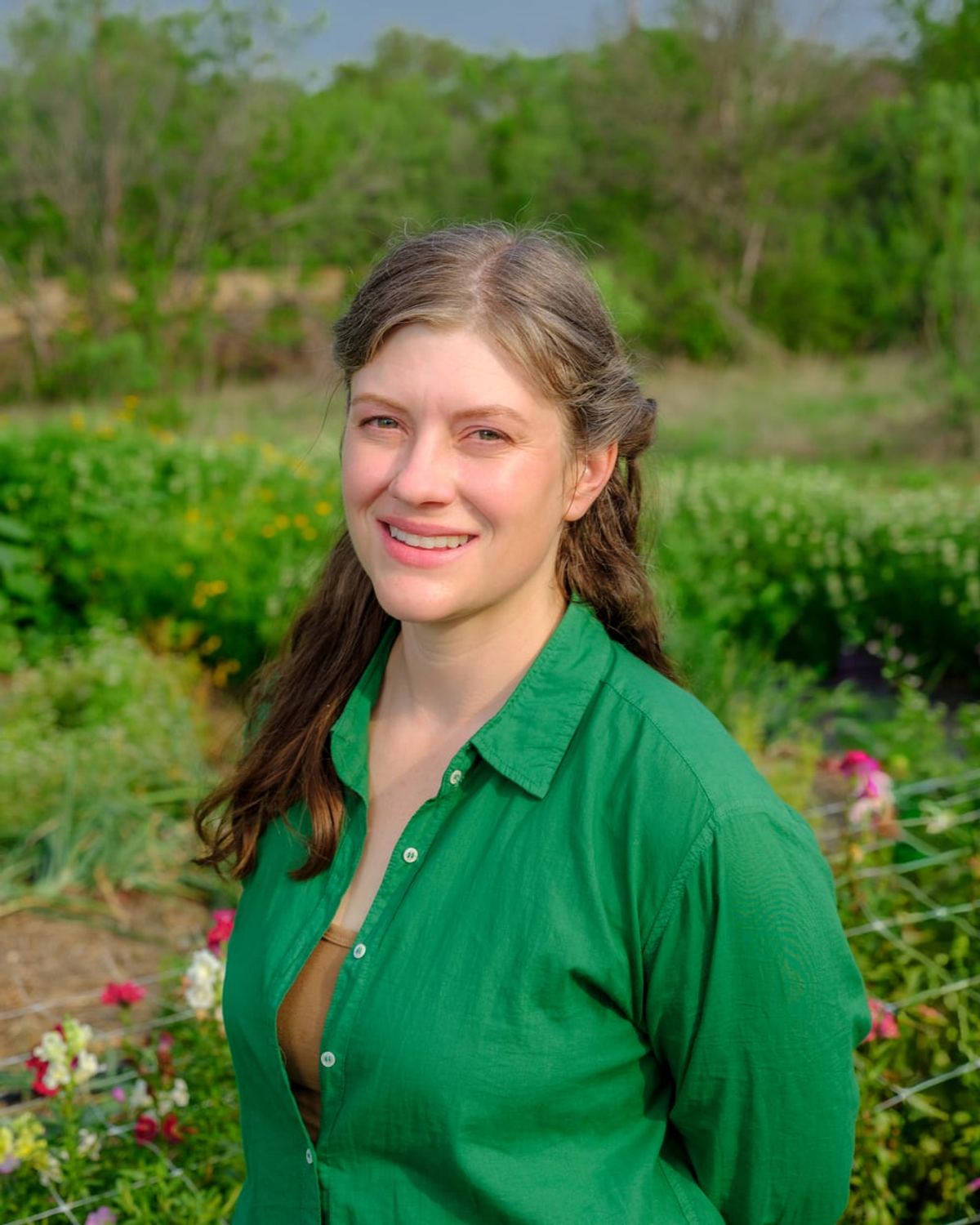 Cecile Parrish, head farmer and master beekeeper, outdoors at the farm