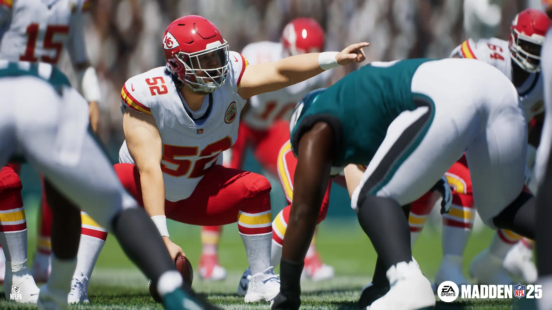 Two football teams stand at the line of scrimmage in the EA Sports Madden NFL 25 video game