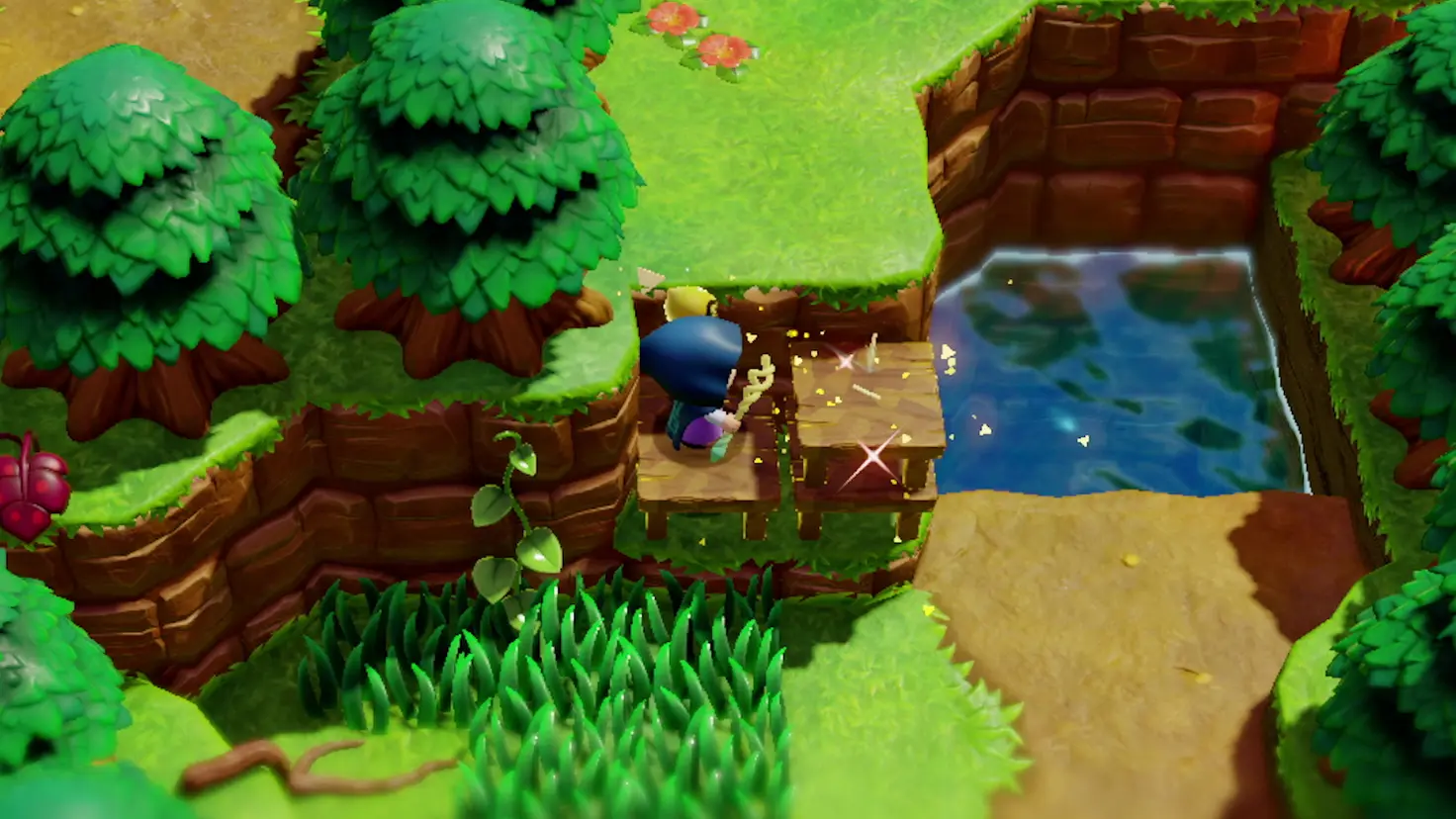 Zelda creates an echo of a wooden table to climb a cliff in The Legend of Zelda: Echoes of Wisdom video game