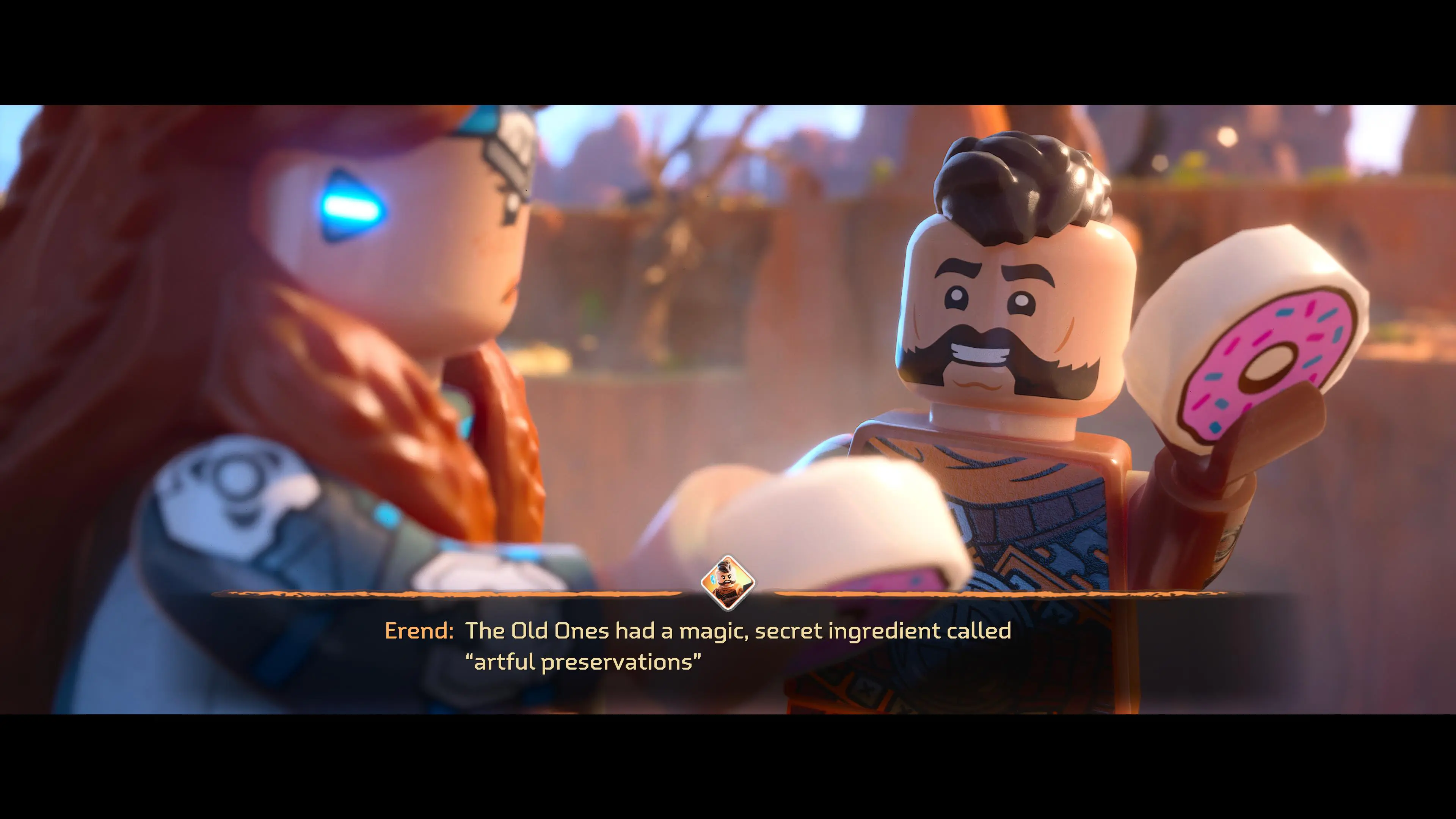 Lego Horizon Adventures screenshot shows Aloy and Erend talking about donuts they've just found.