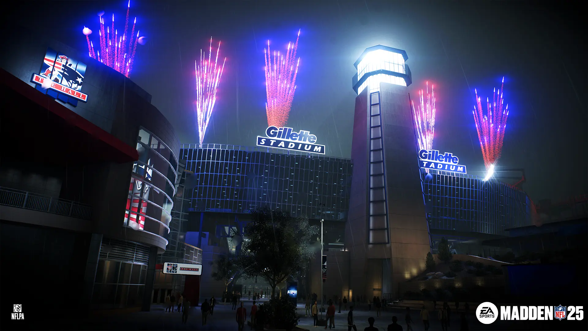 Nighttime exterior view of Gillette Stadium in the EA Sports Madden NFL 25 video game with red fireworks in the sky above