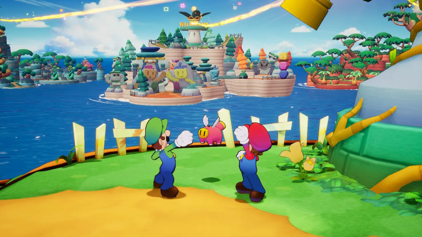 Mario and Luigi raise their fists in the air while standing next to Snoutlet on Shipshape Island in the Mario and Luigi: Brothership video game