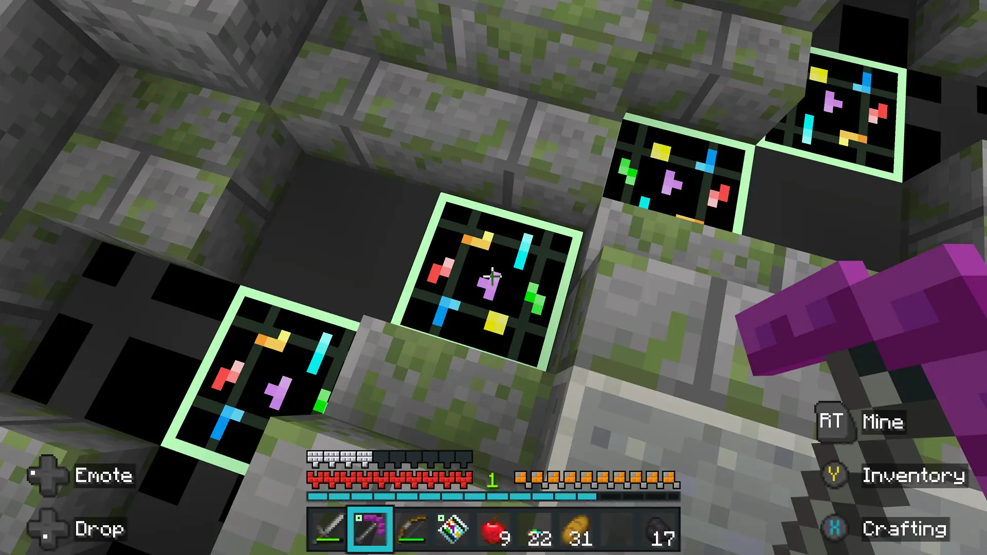 A player looks down at a block containing Mino Shards in the Minecraft Tetris DLC