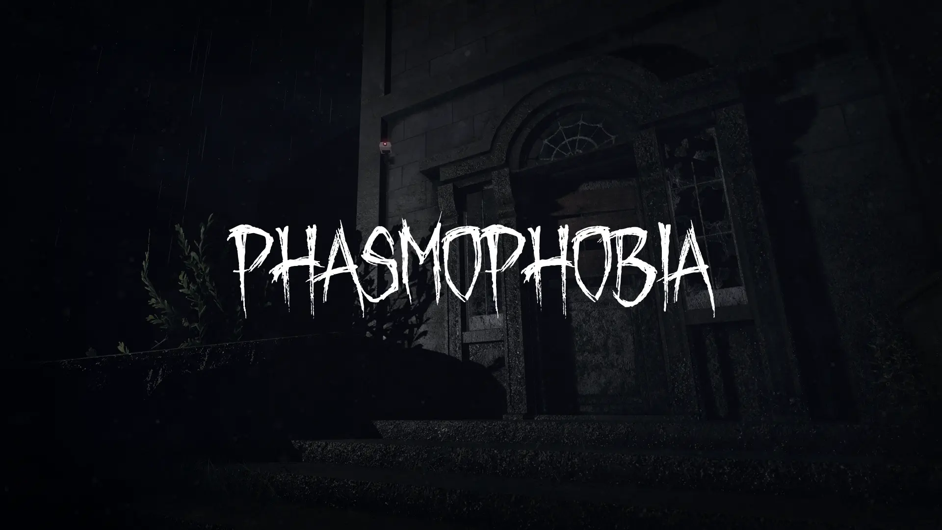 White Phasmophobia logo in front of a spooky building at night