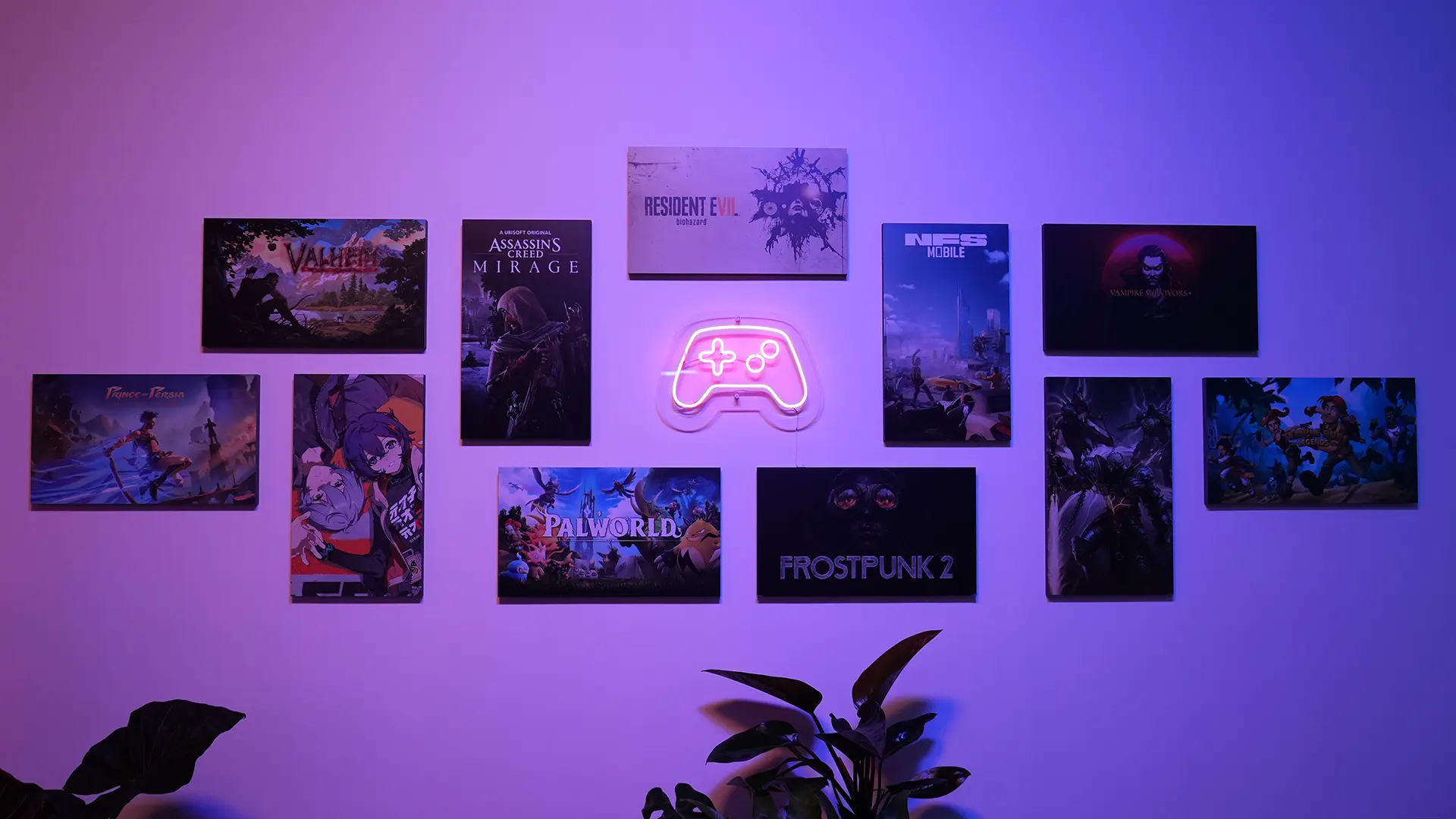 A neon sign in the shape of a video game controller surrounded by posters featuring art from numerous video games