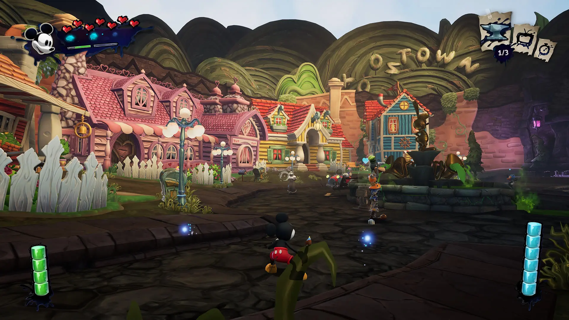 Mickey stands in OsTown, which has been repainted, in the Epic Mickey: Rebrushed video game