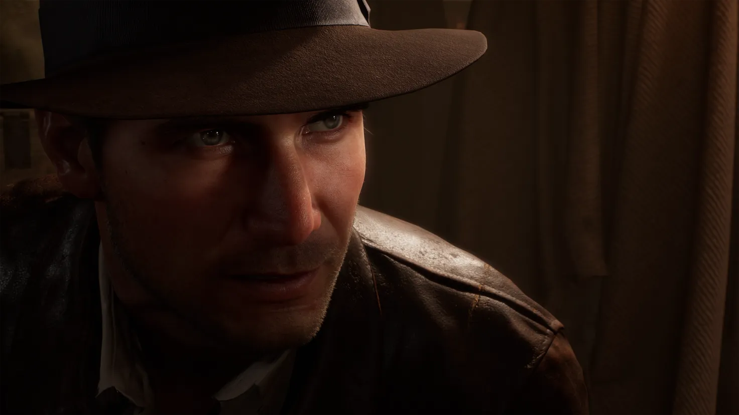 Indiana Jones hides in the shadows in the Indiana Jones and The Great Circle video game