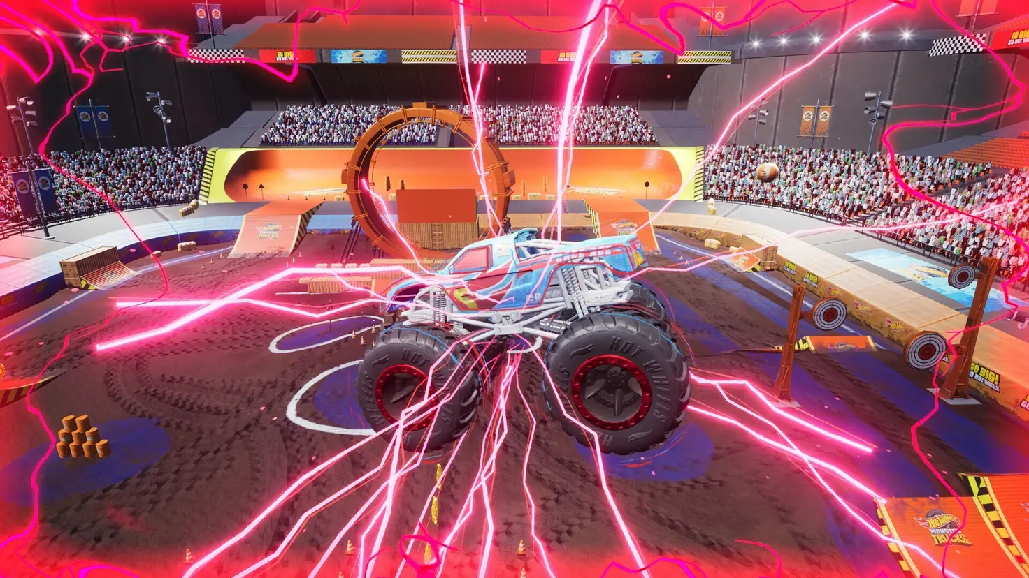 A Hot Wheels monster truck flies through the air emitting sparks of electricity in all directions within an arena