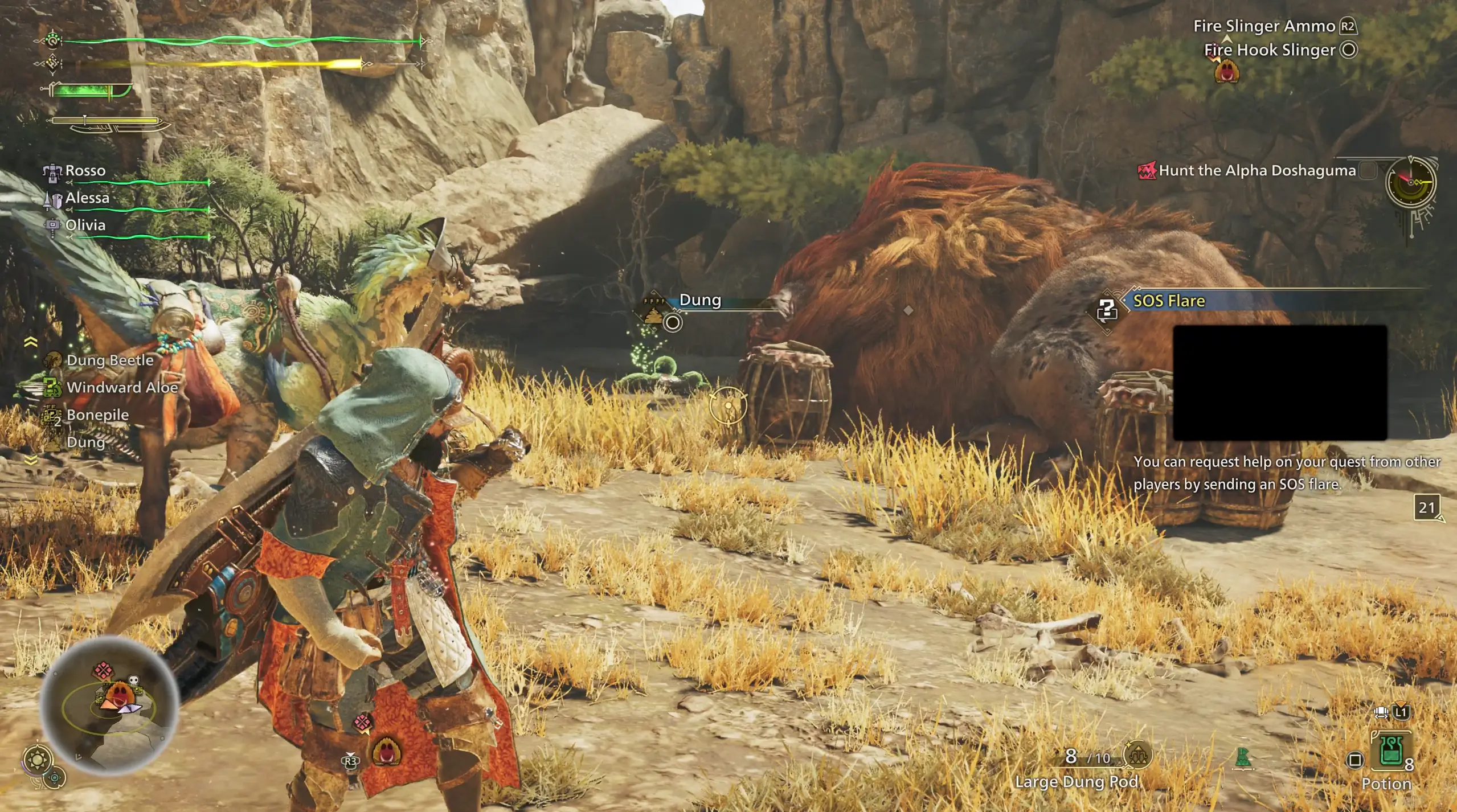 The player character looks at a sleeping monster surrounded by bomb traps in the Monster Hunter Wilds video game