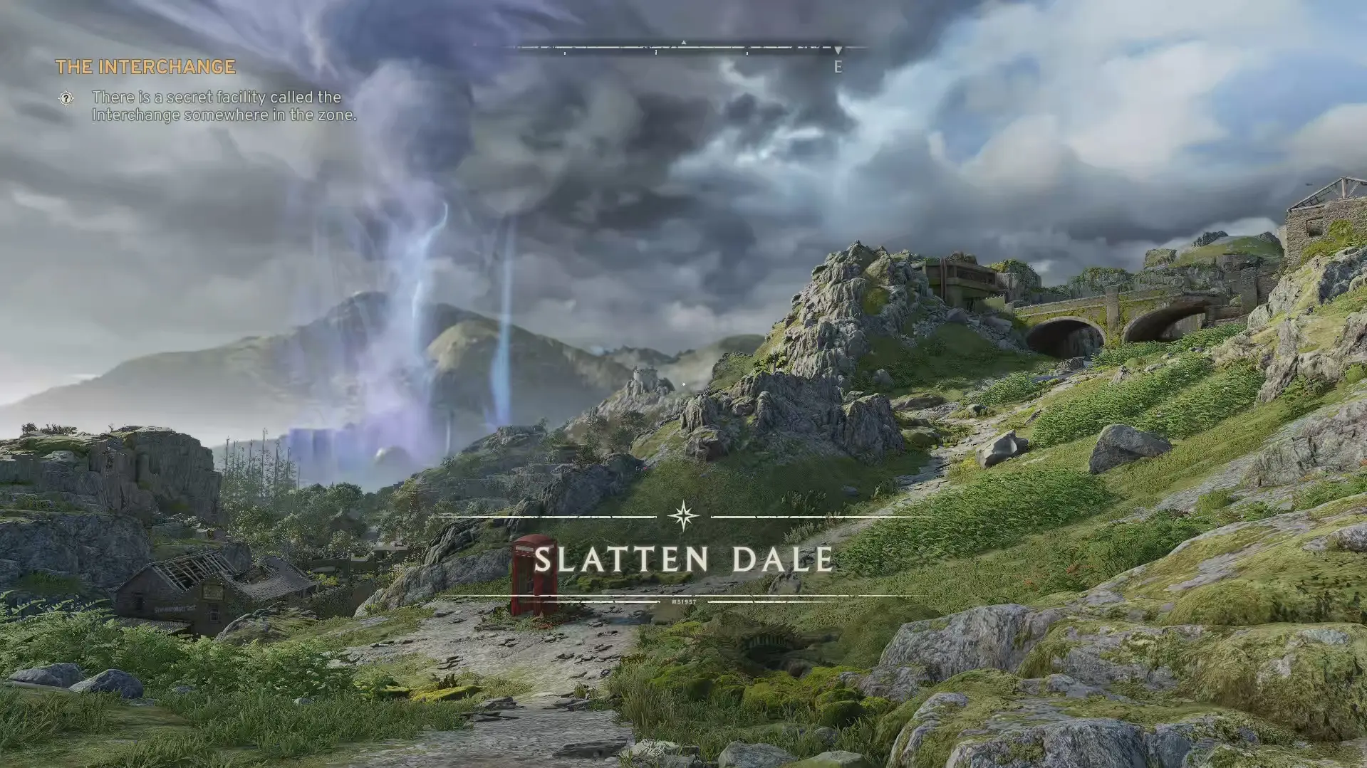 A green lanscape called Slatten Dale in Atomfall. A mysterious etheral force can be seen in the air and clouds in the distance.