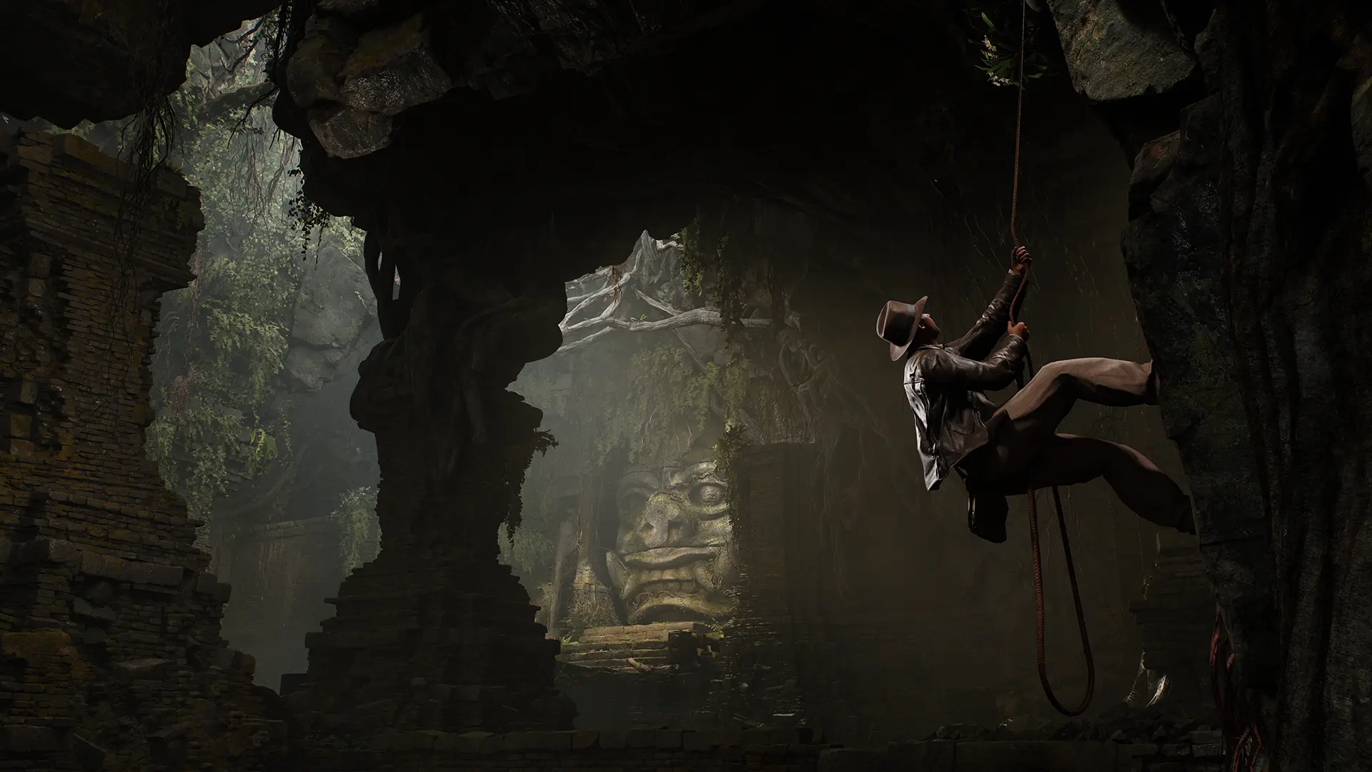 Indiana Jones climbs a rock wall using a rope in the Indiana Jones and The Great Circle video game