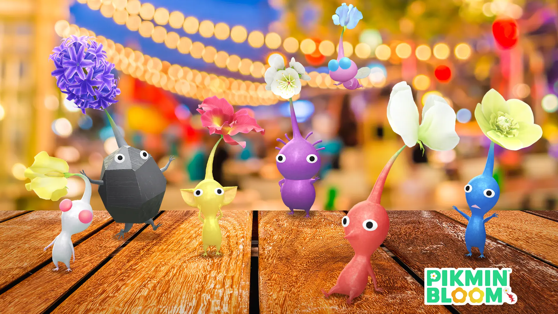 White, Rock, Yellow, Purple, Winged, Red, and Blue Pikmin on a wooden table with a party setting behind