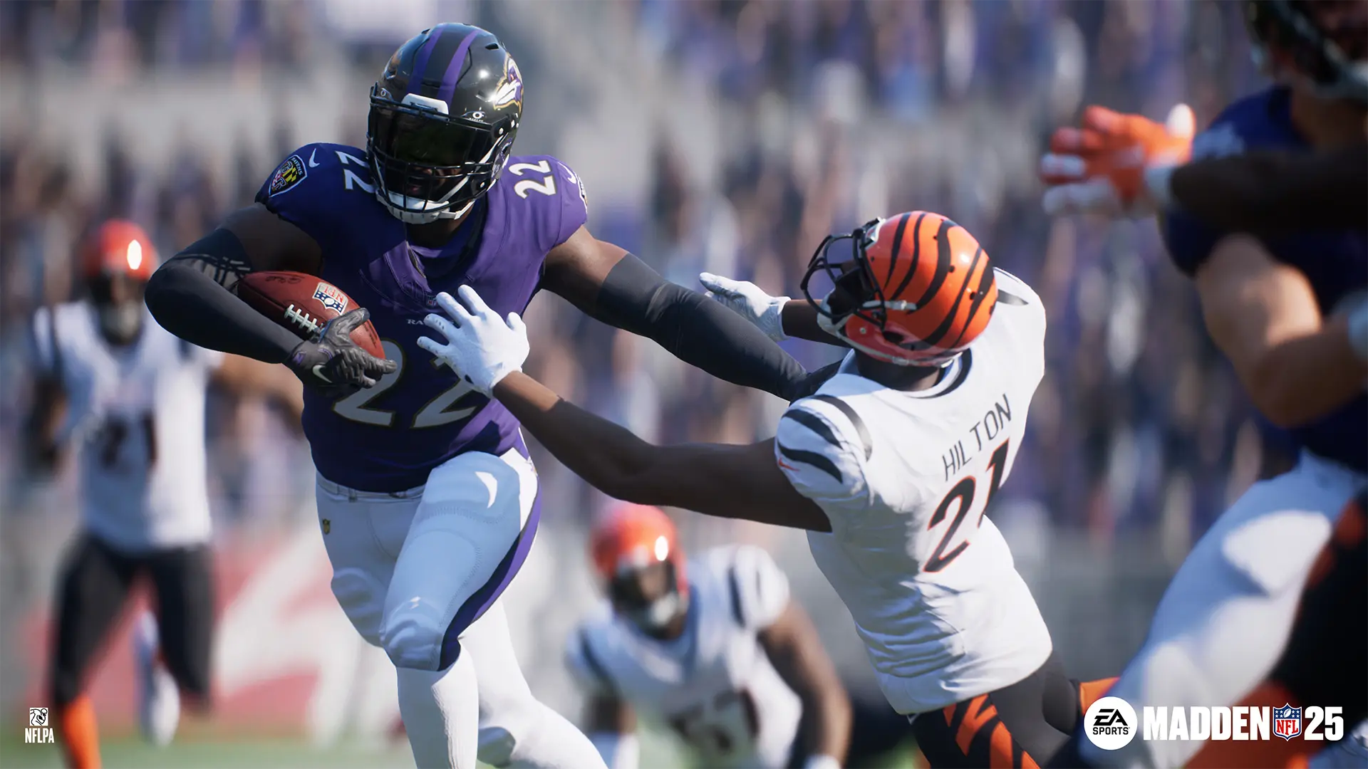 A football player reaches for the player running with the ball in the EA Sports Madden NFL 25 video game