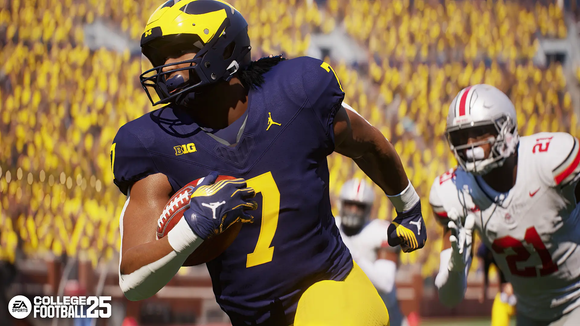 Michigan Wolverines defensive back Makari Paige runs with the football during a game