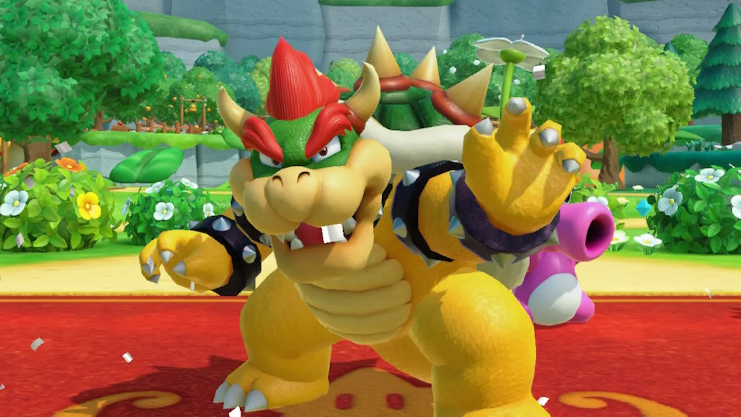 Bowser celebrates a win in Super Mario Party Jamboree