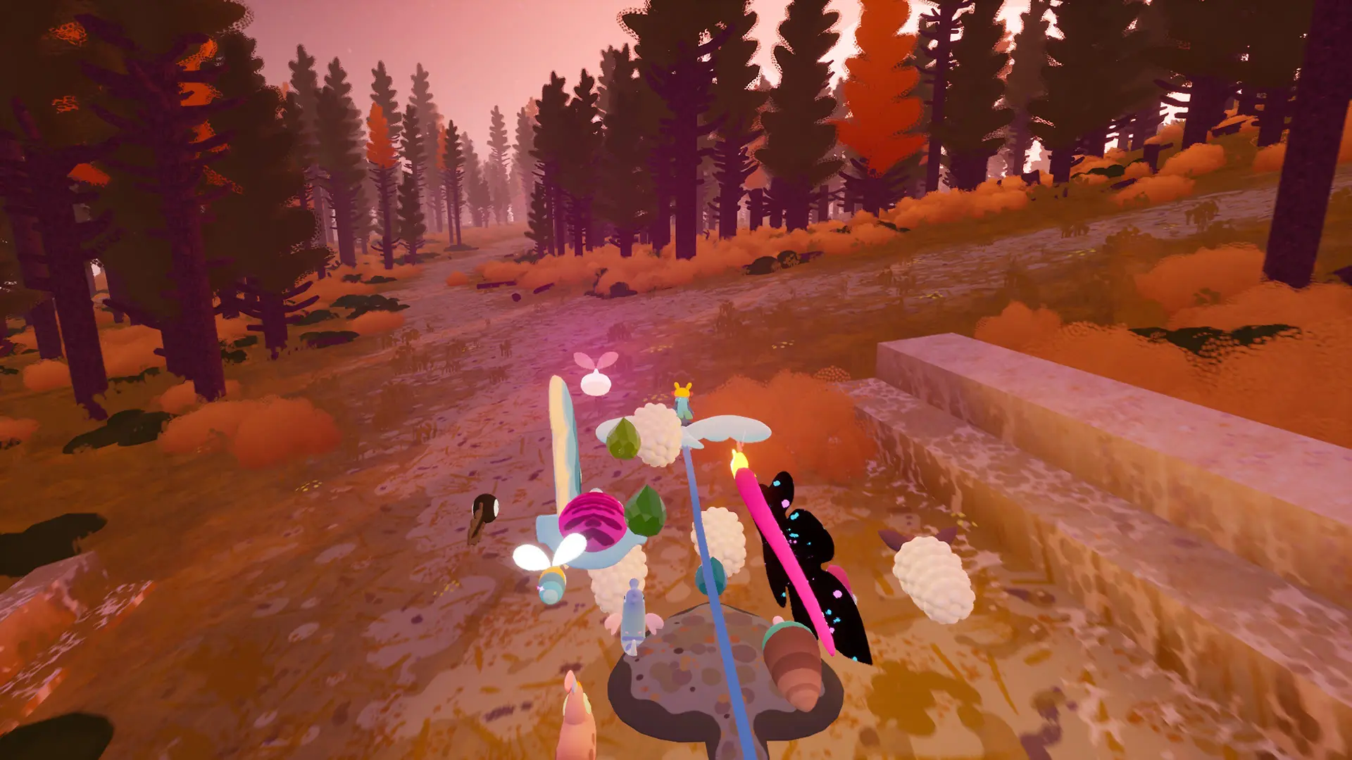 The player in the Flock video game rides on a bird flying through a forest while followed by a group of colorful creatures