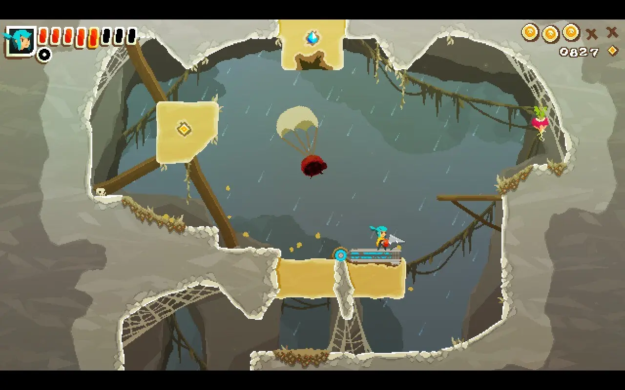 Pepper pauses in a puzzle cave on top of a flippable switch which can be hit from below. A ladybug falls with a parachute in the background.