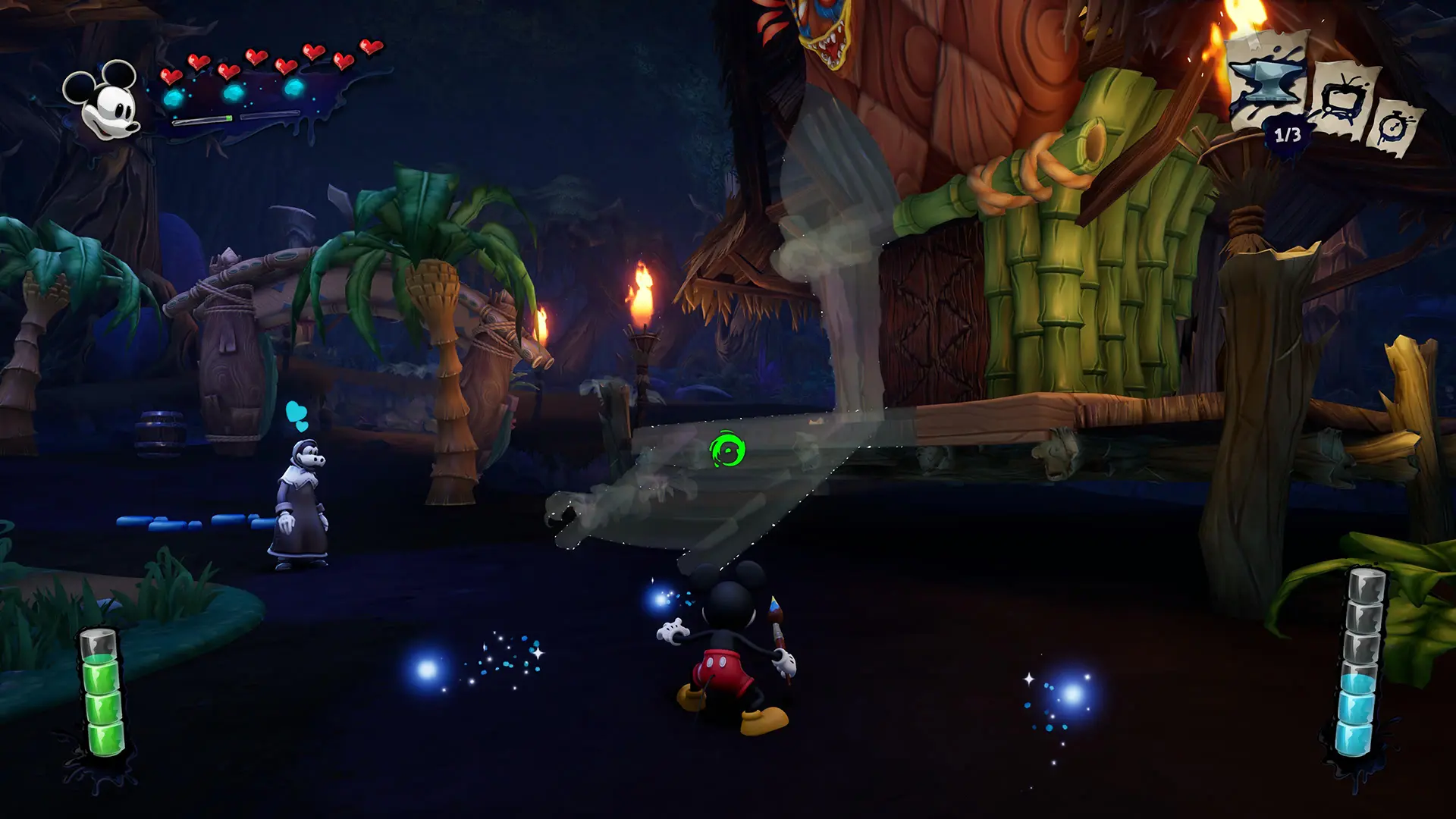 Mickey stands in a jungle village looking at objects that can be painted in the Epic Mickey: Rebrushed video game