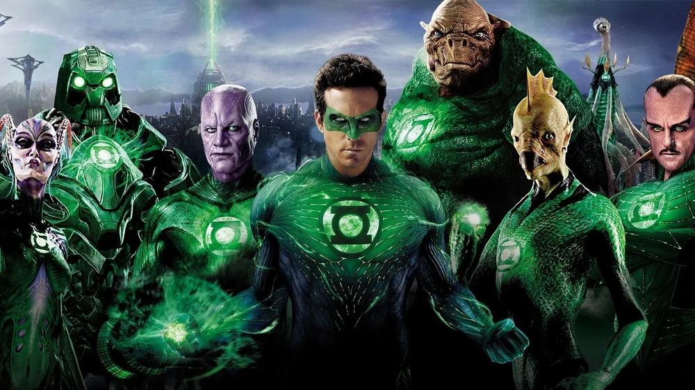 Promotional image from the 2011 film Green Lantern showing Ryan Reynolds as Hal Jordan among Corps members, with Mark Strong as Sinestro in a green uniform at the right of the line.