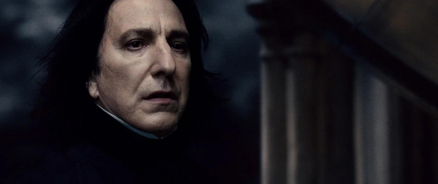 Alan Rickman as Severus Snape looks ahead on the Astronomy Tower.