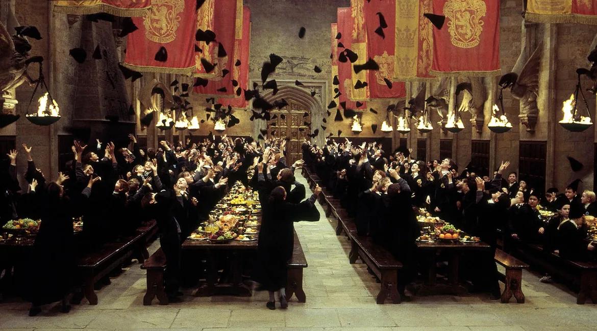 The Great Hall hung with Gryffindor banners as the house celebrates winning the House Cup.