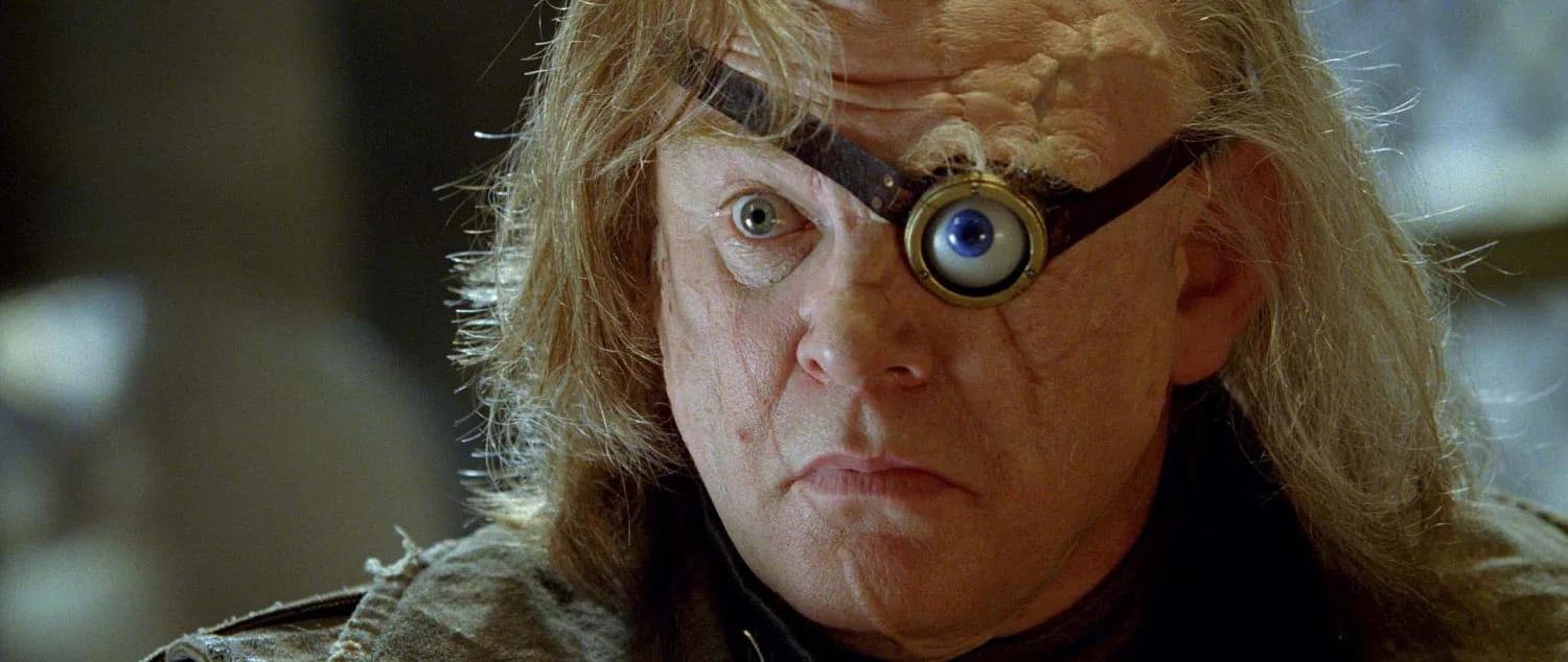 Brendan Gleeson as Alastor Moody faces forward with his magical eye visible.
