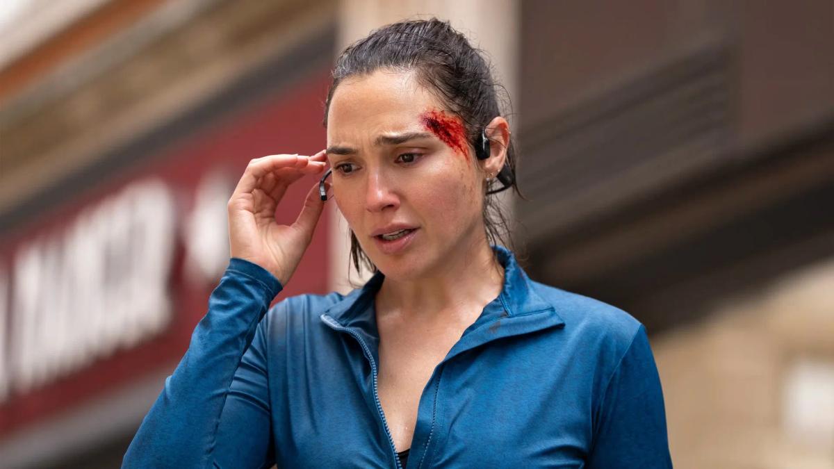 Maia Marten stops in a London street, sweating, with a deep cut bleeding above her right eyebrow.