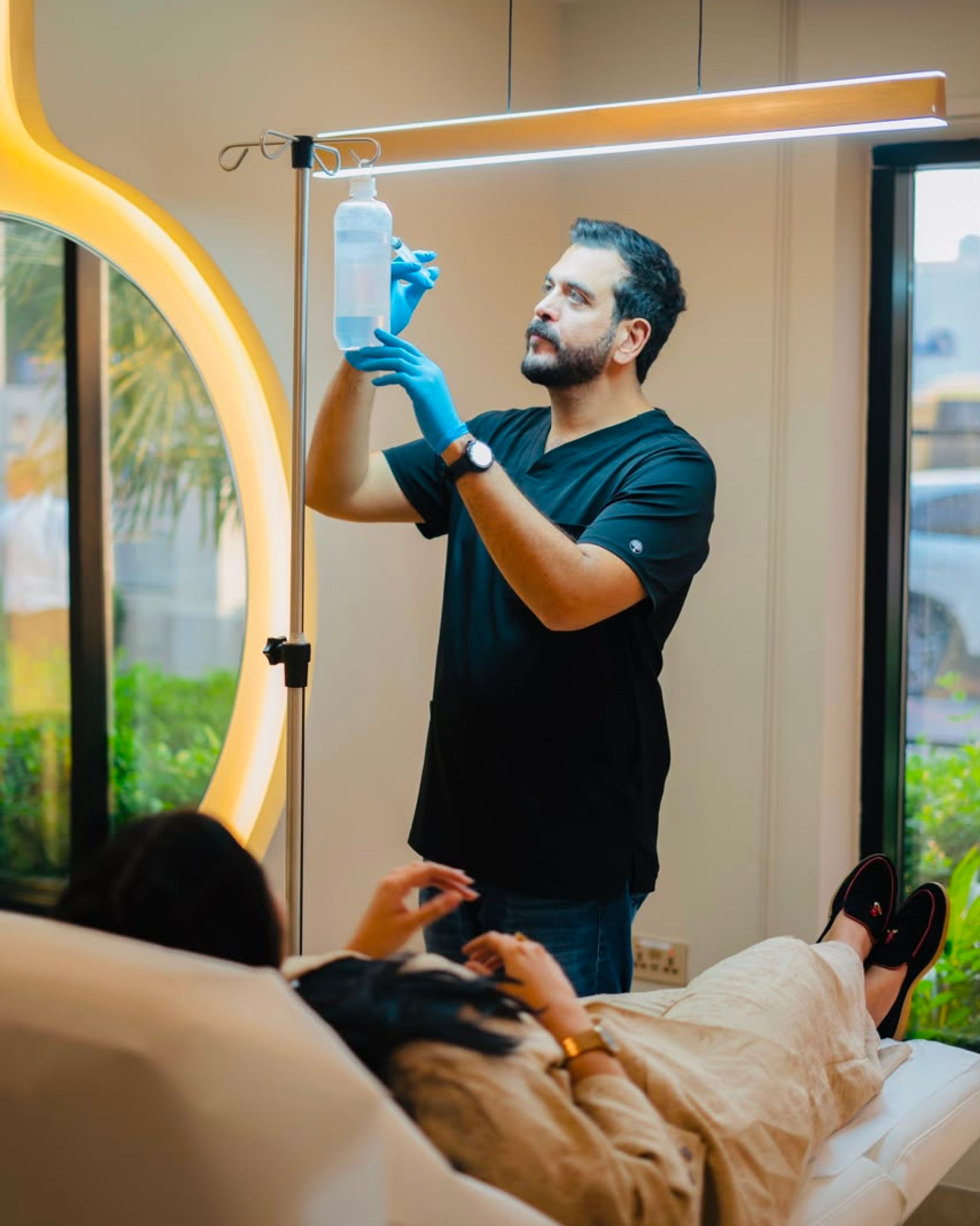 Client receiving IV wellness treatment before an event