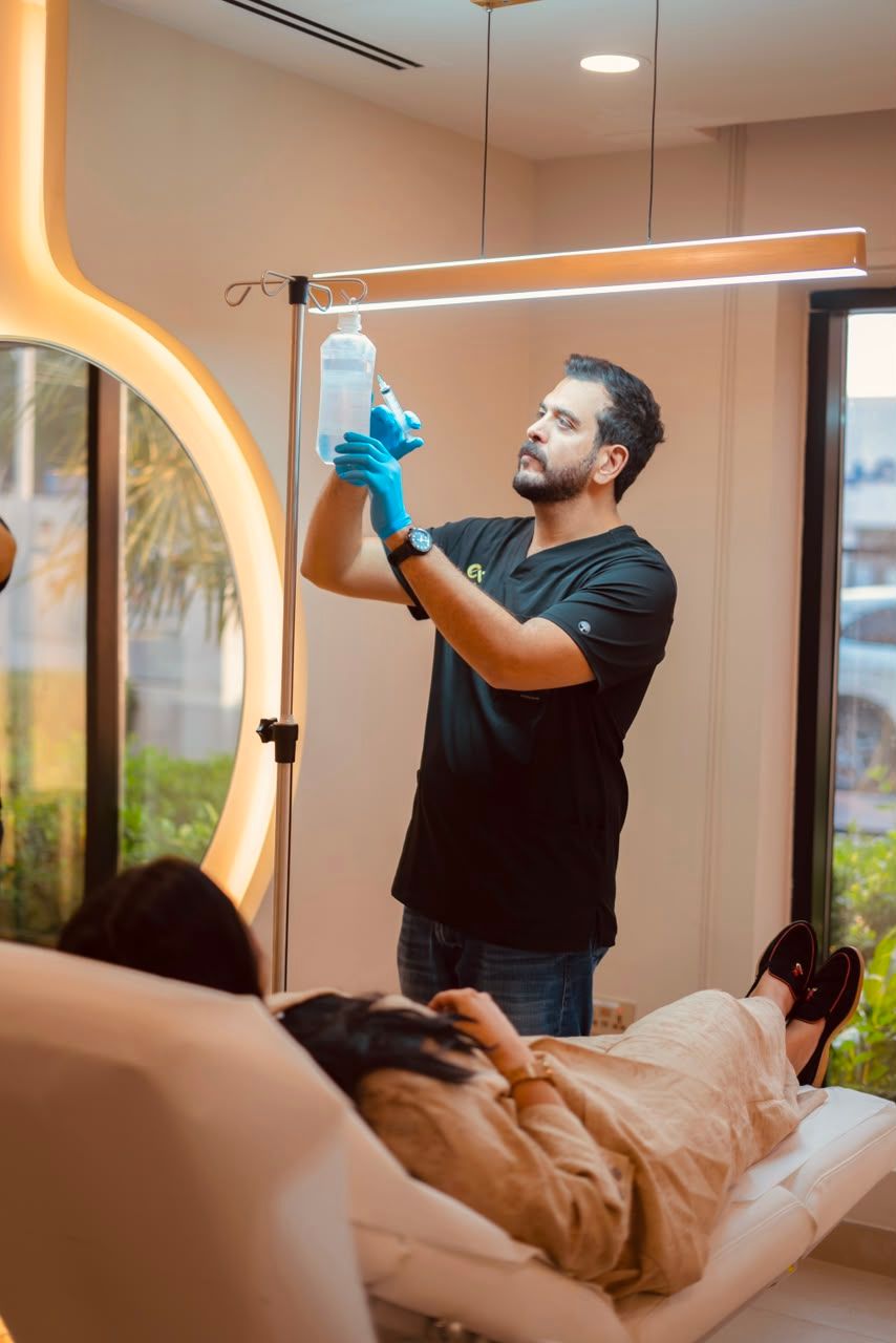 Licensed healthcare professional preparing an IV wellness treatment