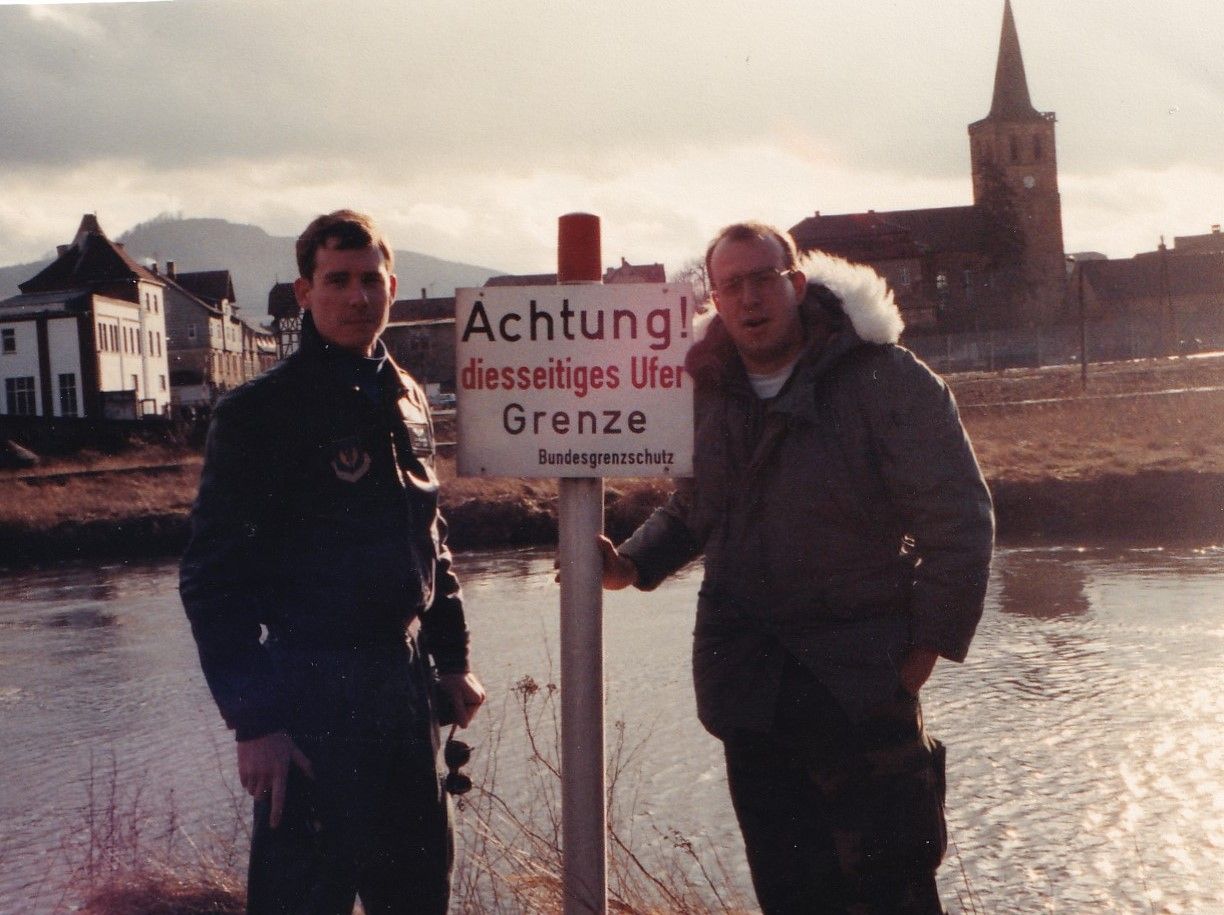 "Achtung! diesseitiges Ufer Grenze." Translation: "Warning! This riverbank is the border." Undaunted...JD and Mak on the West German bank of the Elbe River. 