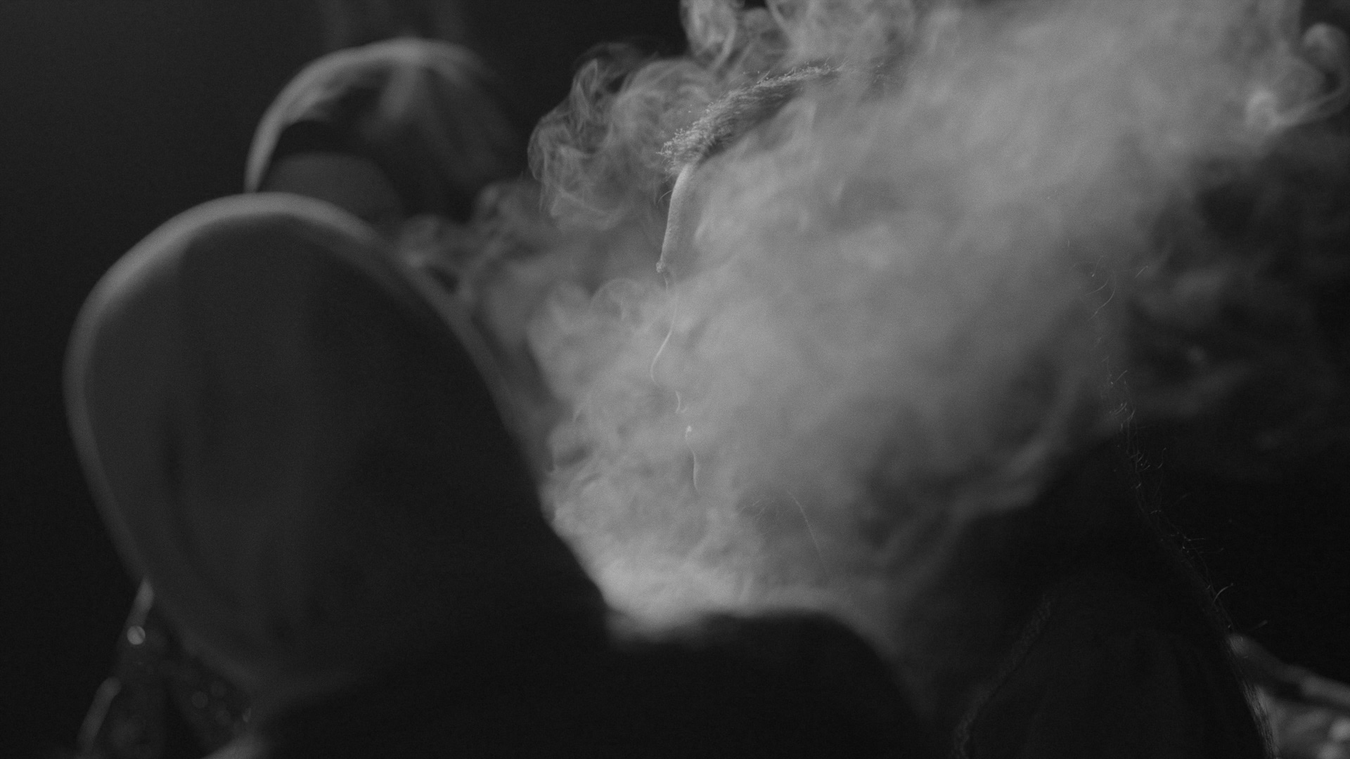 Palestinian and First Nations women participate in a smoking ceremony.