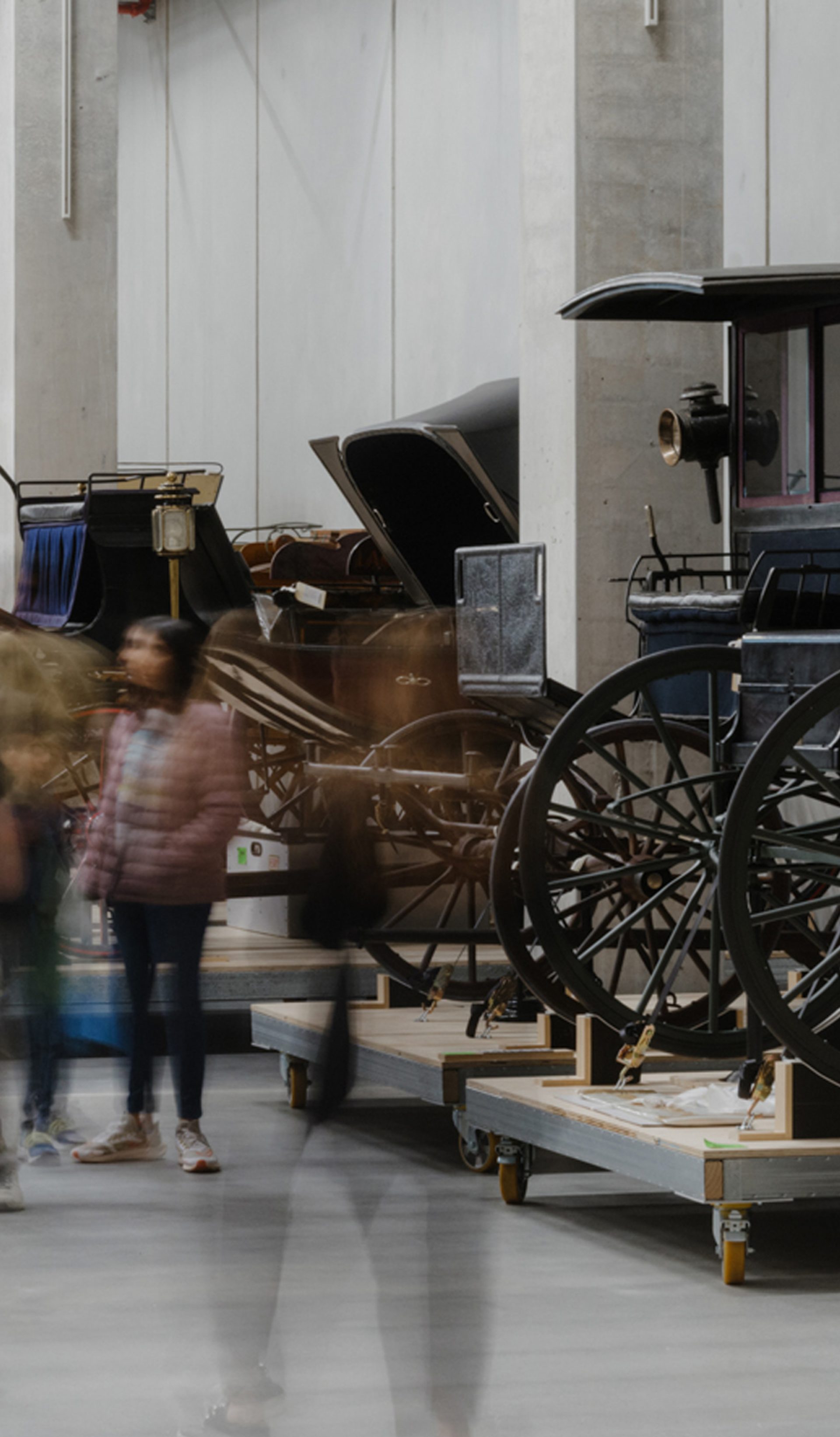 Photo of a group of people viewing collection objects at Powerhouse Castle Hill.