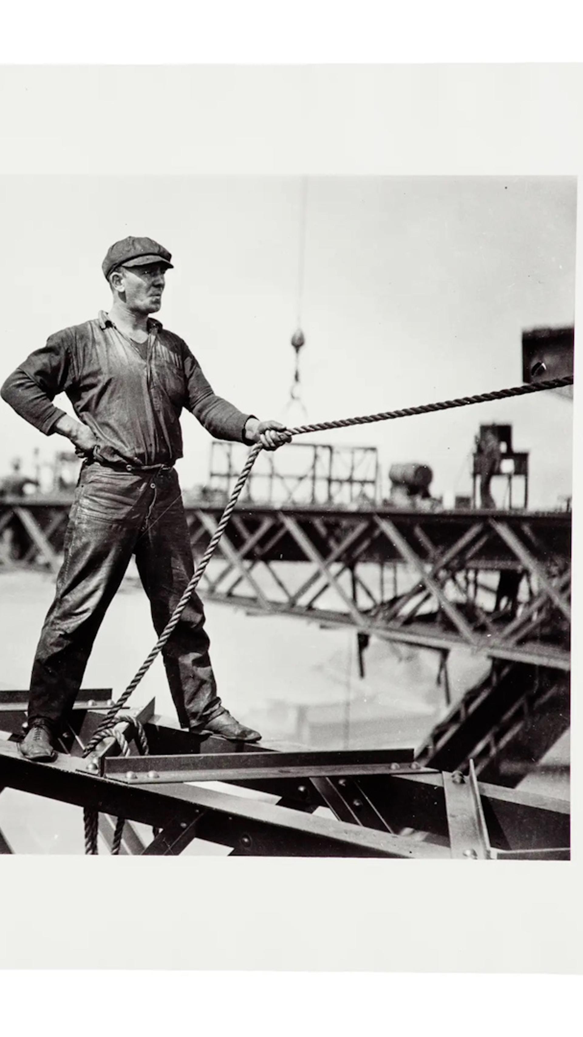The images document the construction of the Sydney Harbour Bridge. Each print has a white border. Sign from exhibition and copy negative of sign.