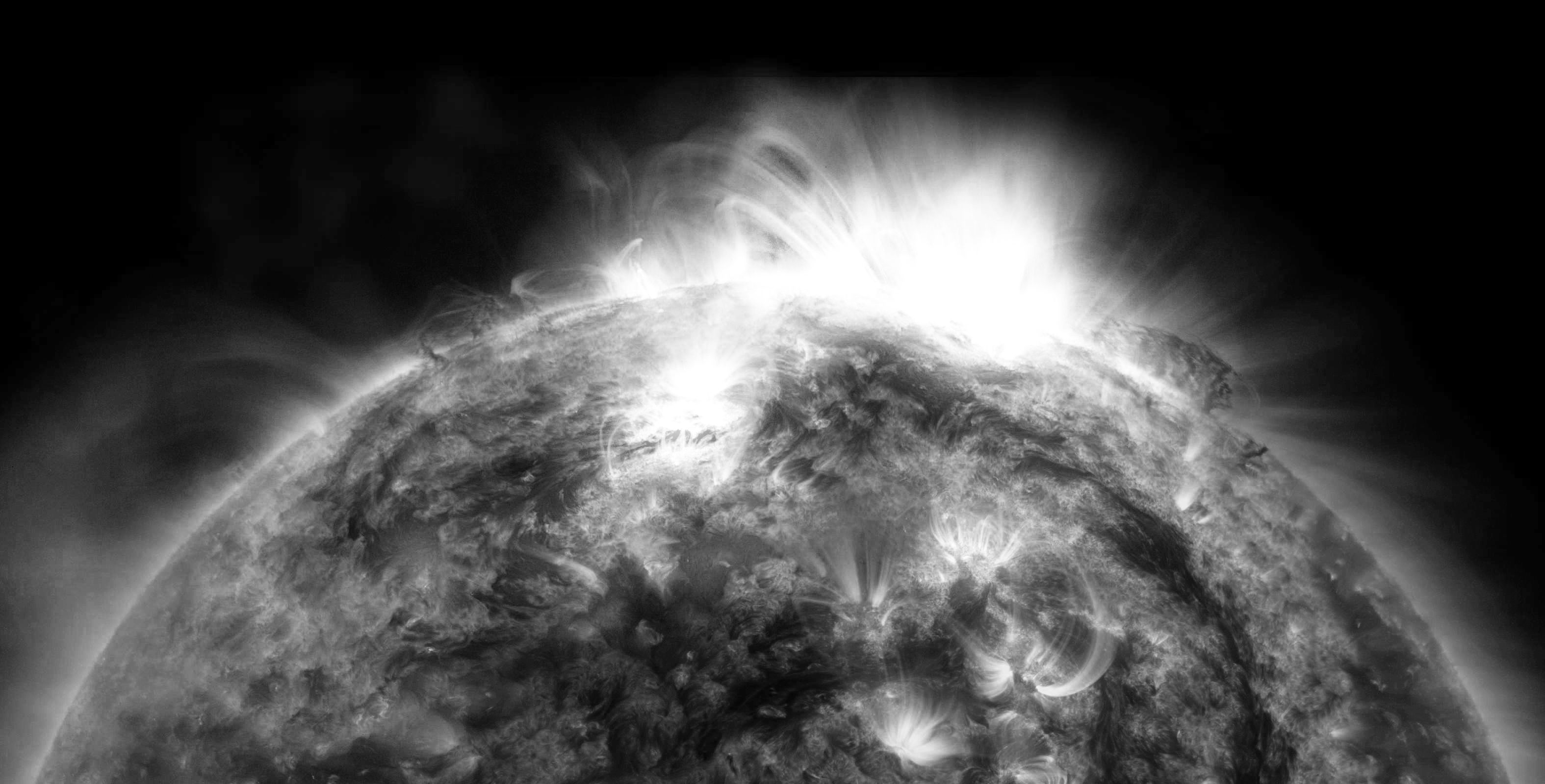 X-rays stream off the sun in this first picture of the sun, overlaid on a picture taken by NASA Solar Dynamics Observatory SDO, taken by NASA NuSTAR. The field of view covers the west limb of the sun.