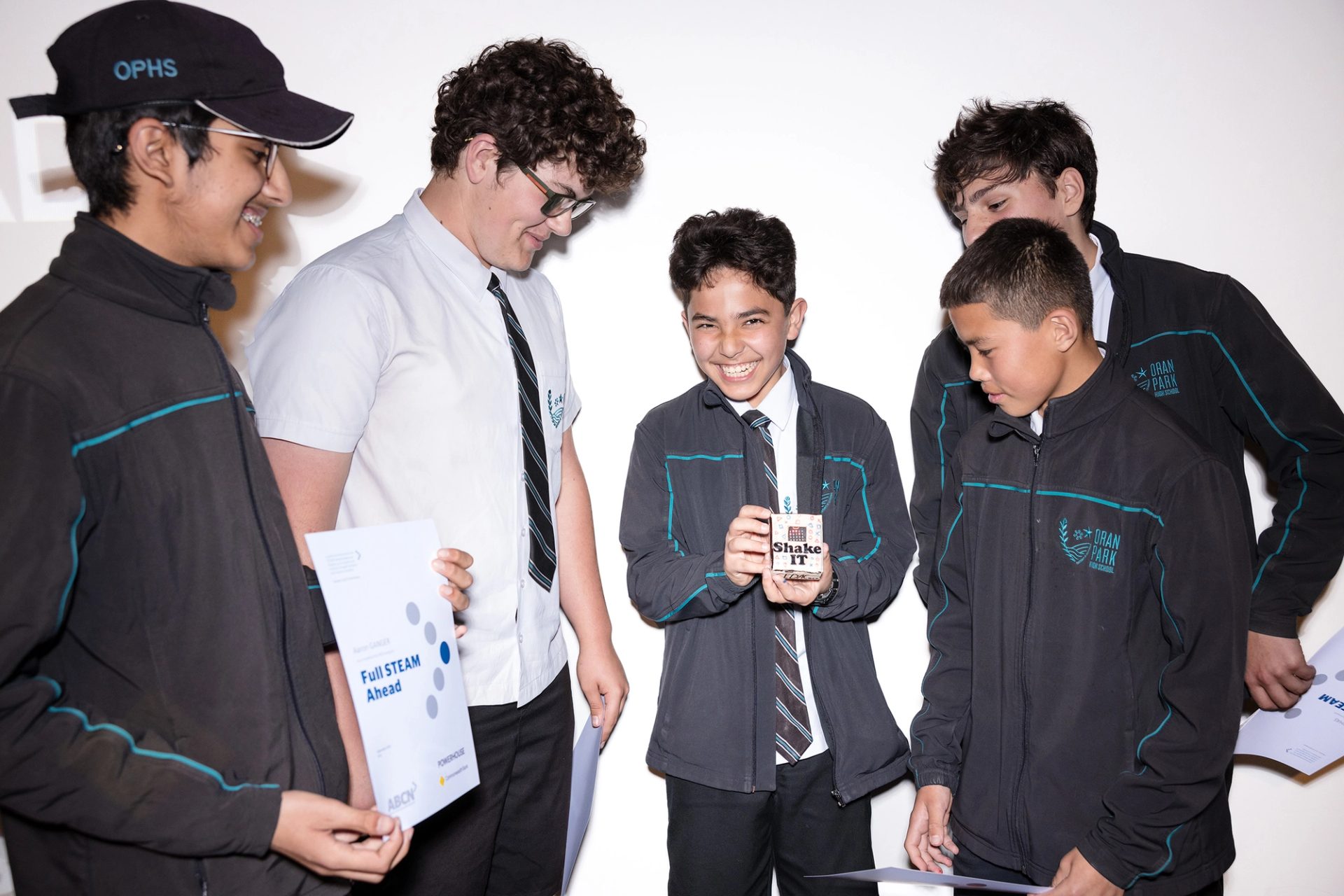 Give school boys in uniform look at their prototype