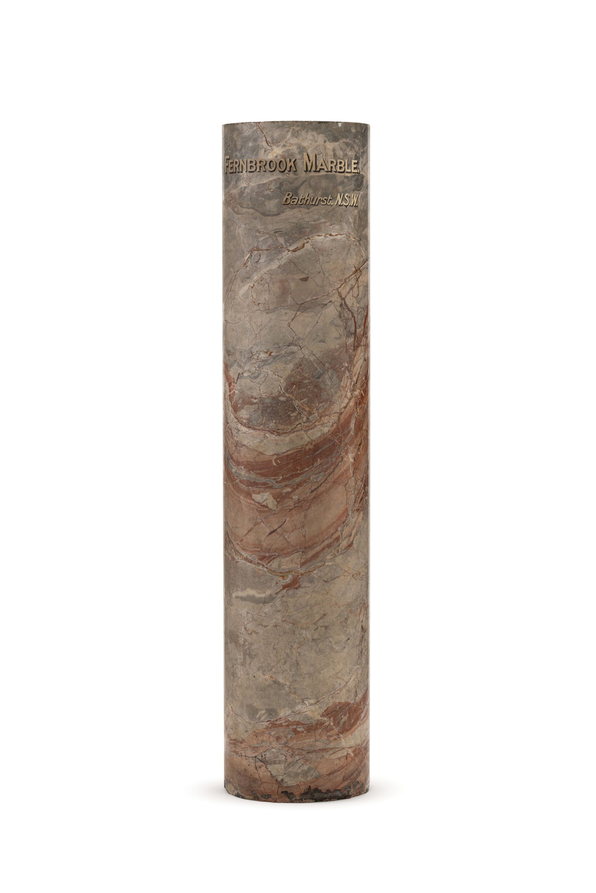 Museum collection photograph of marble pillar on white background