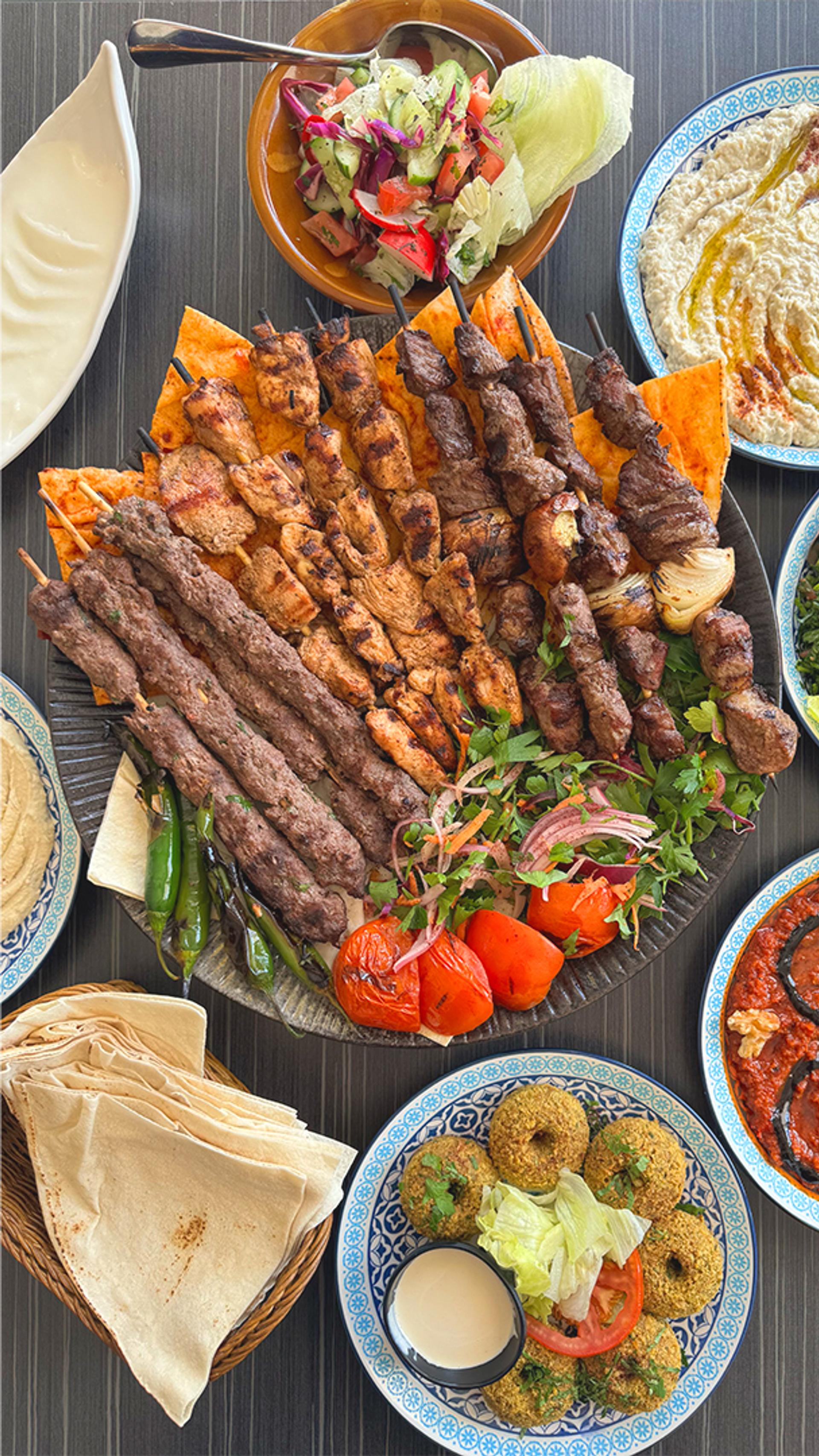 Triptych freaturing Al Shami dishes of varying sizes on a table, Al Shami owner and chef Ali Snoubar and falafel.