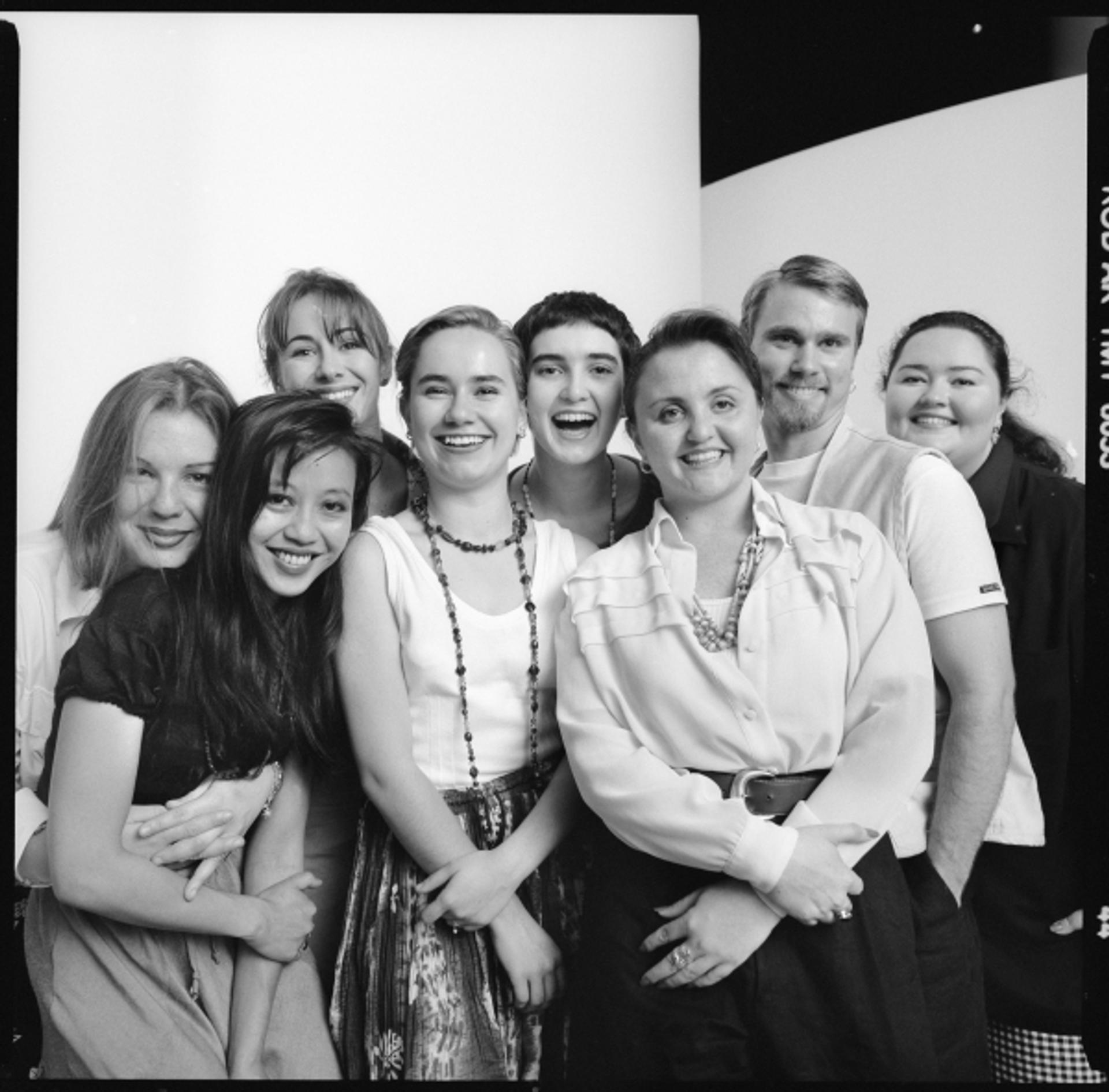 Group of students smiling at the camera.