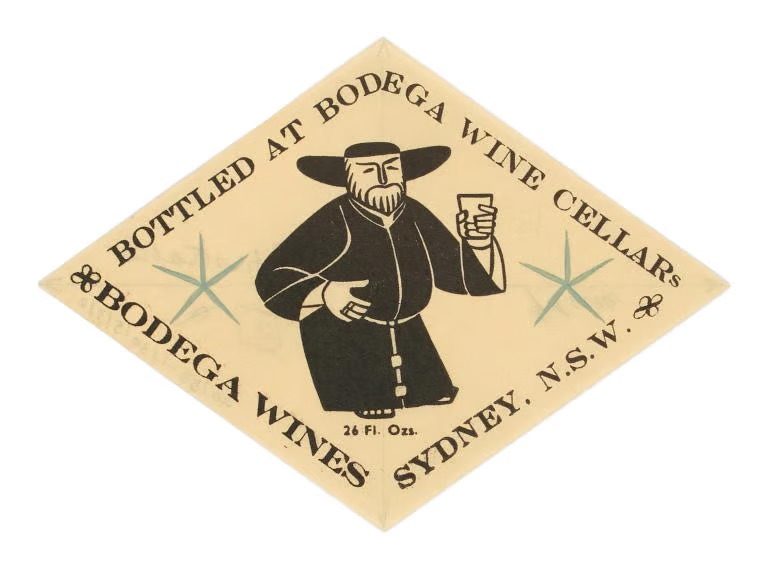 A diamond shaped wine bottle label with the Bodega Wine Cellars logo.