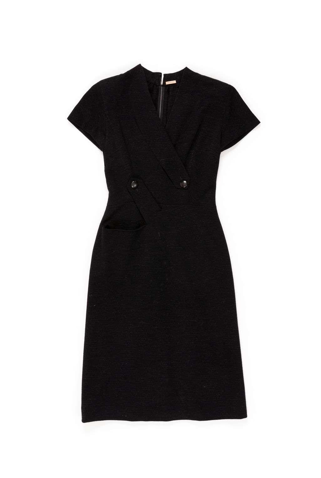 Black dress with a high neckline, short sleeves, and two big buttons along the waist.