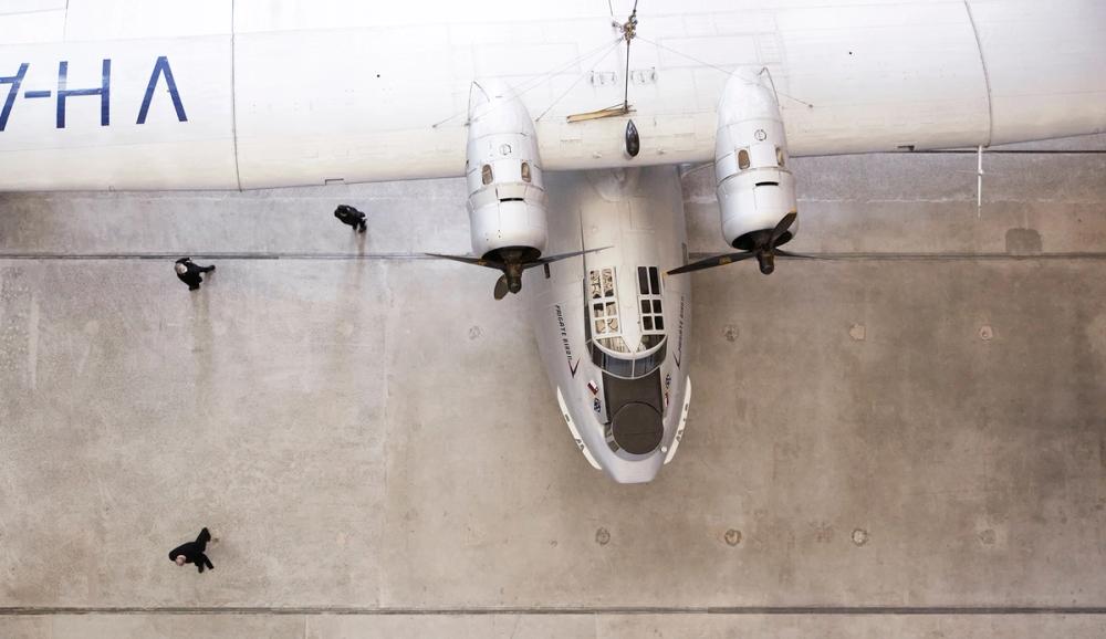 Aerial view of nose and wingspan of silver plane, Catalina Frigate Bird II