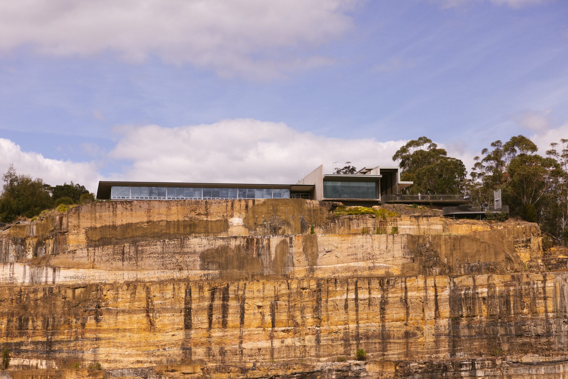 Wall to the dam, with building atop
